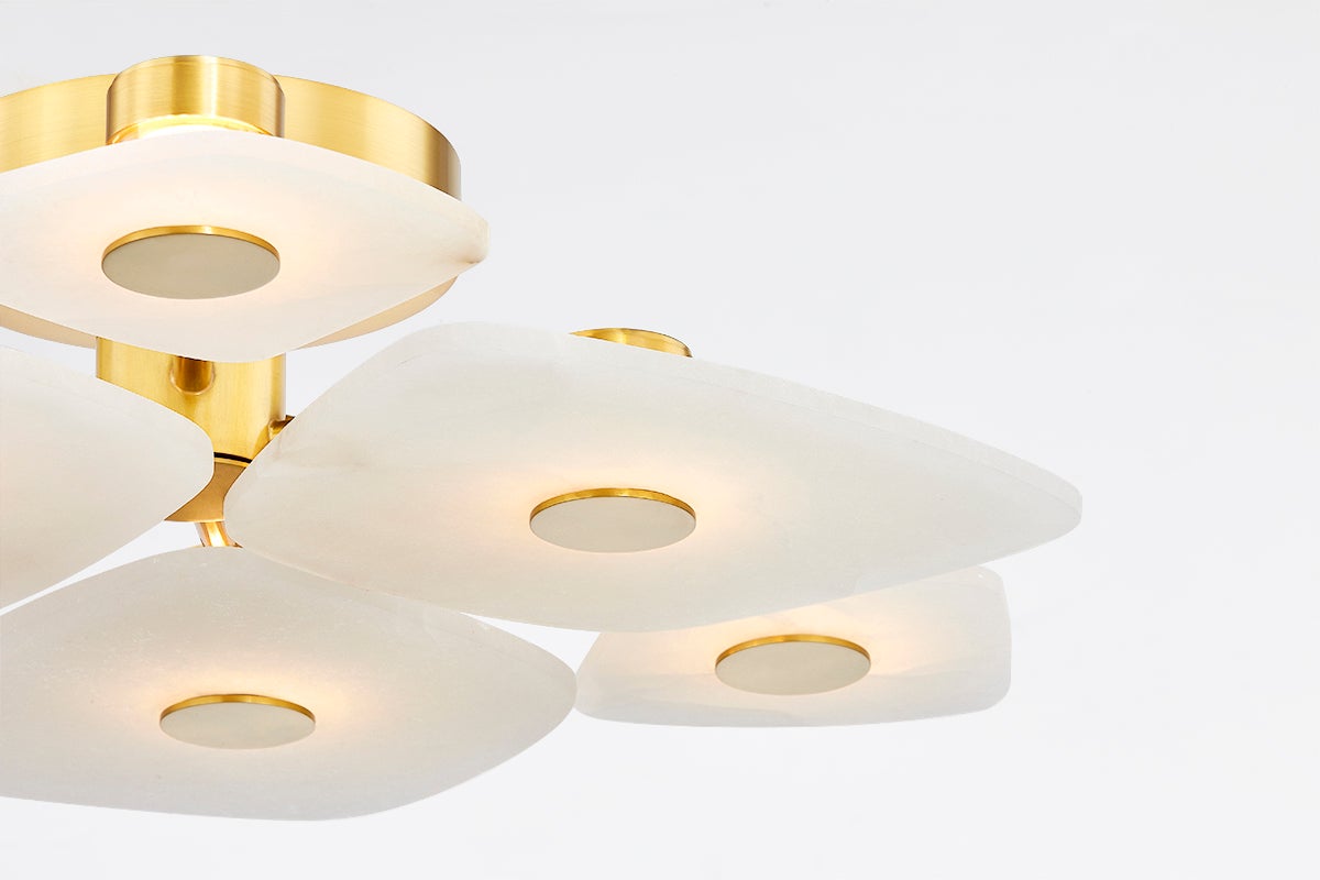 Close-up of the Holmdel Semi Flush 27.75" in aged brass showing the shade profile and mounting canopy.