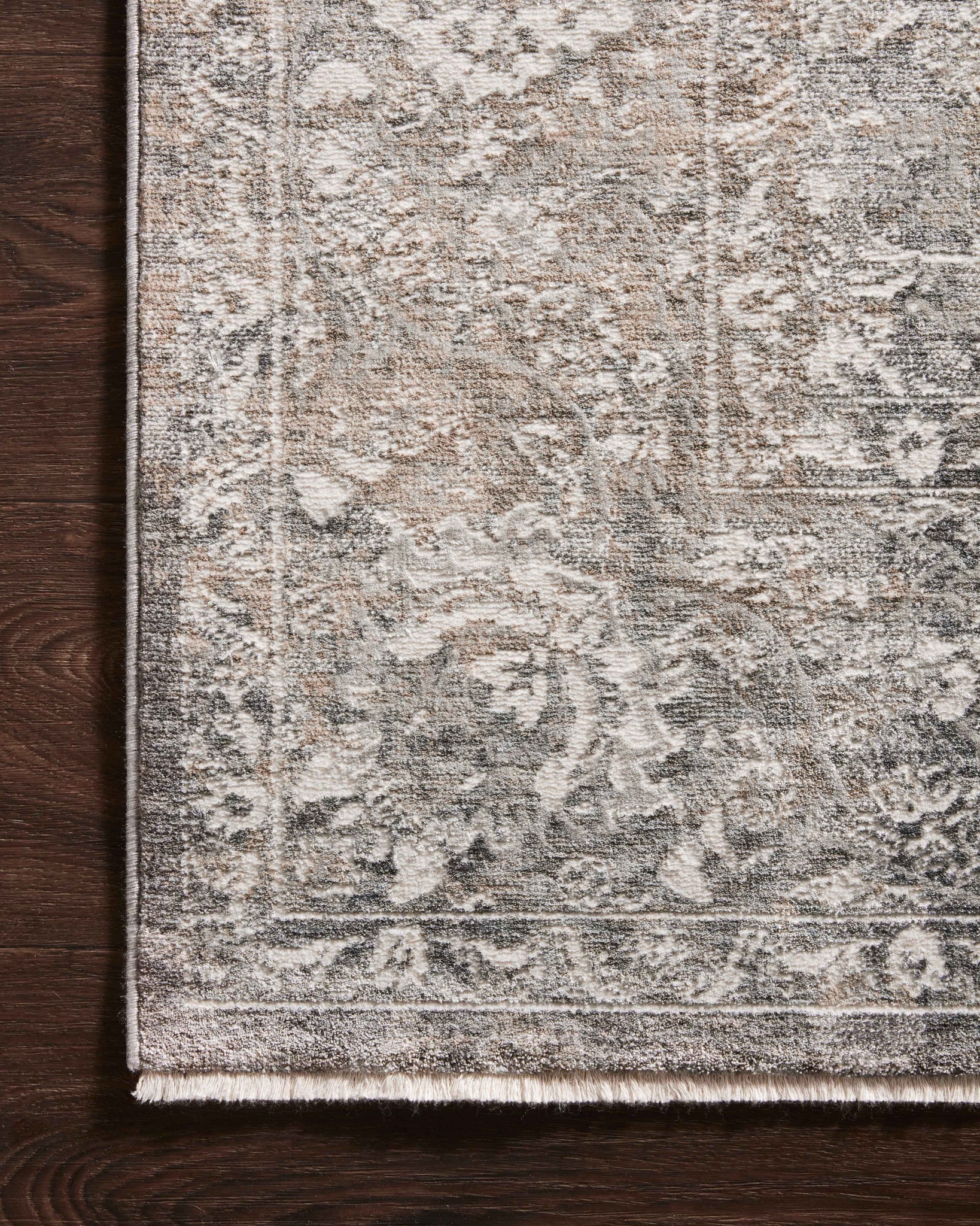 Side view of the Homage Stone / Ivory rug.