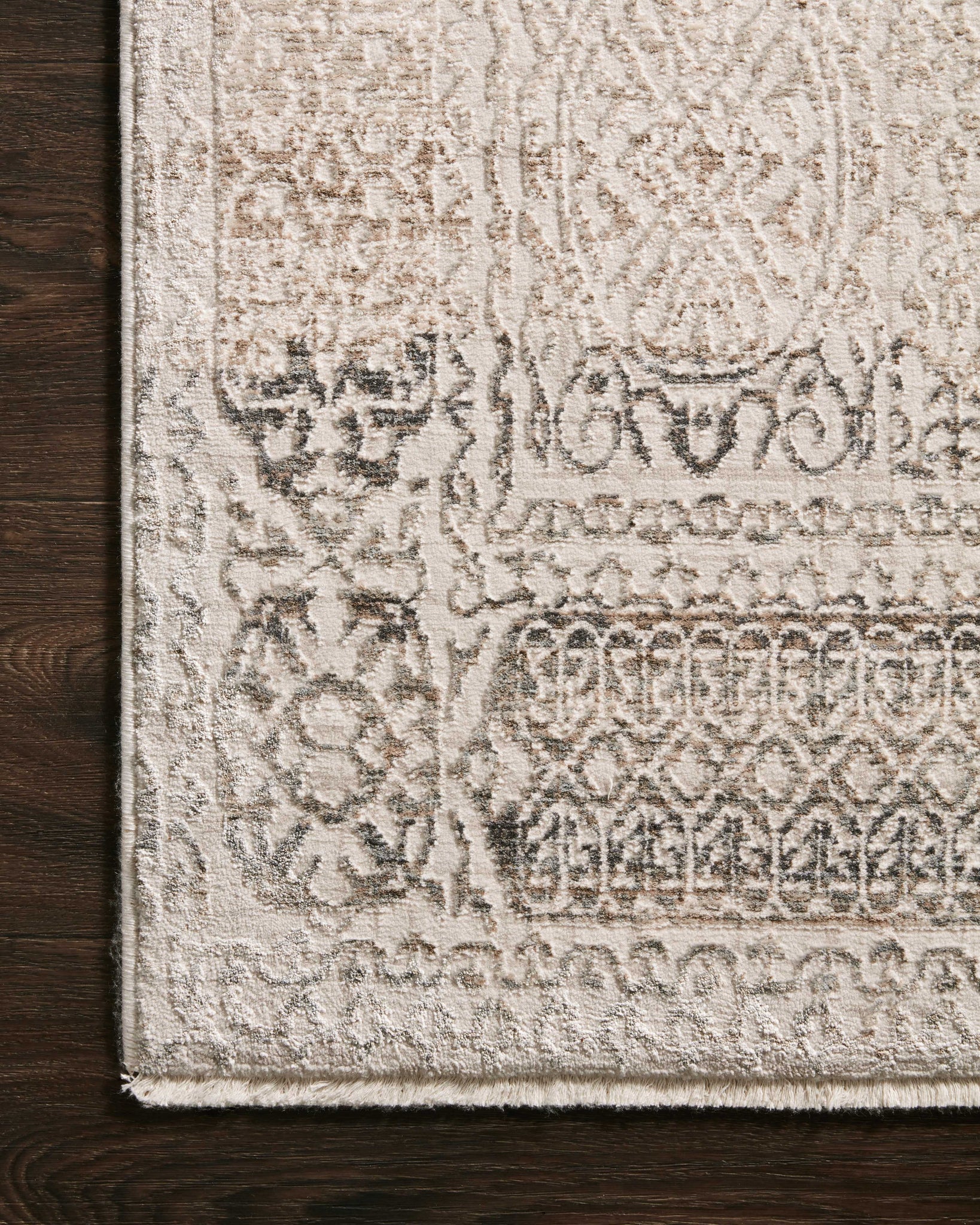 Side view of the Homage Ivory / Silver rug.