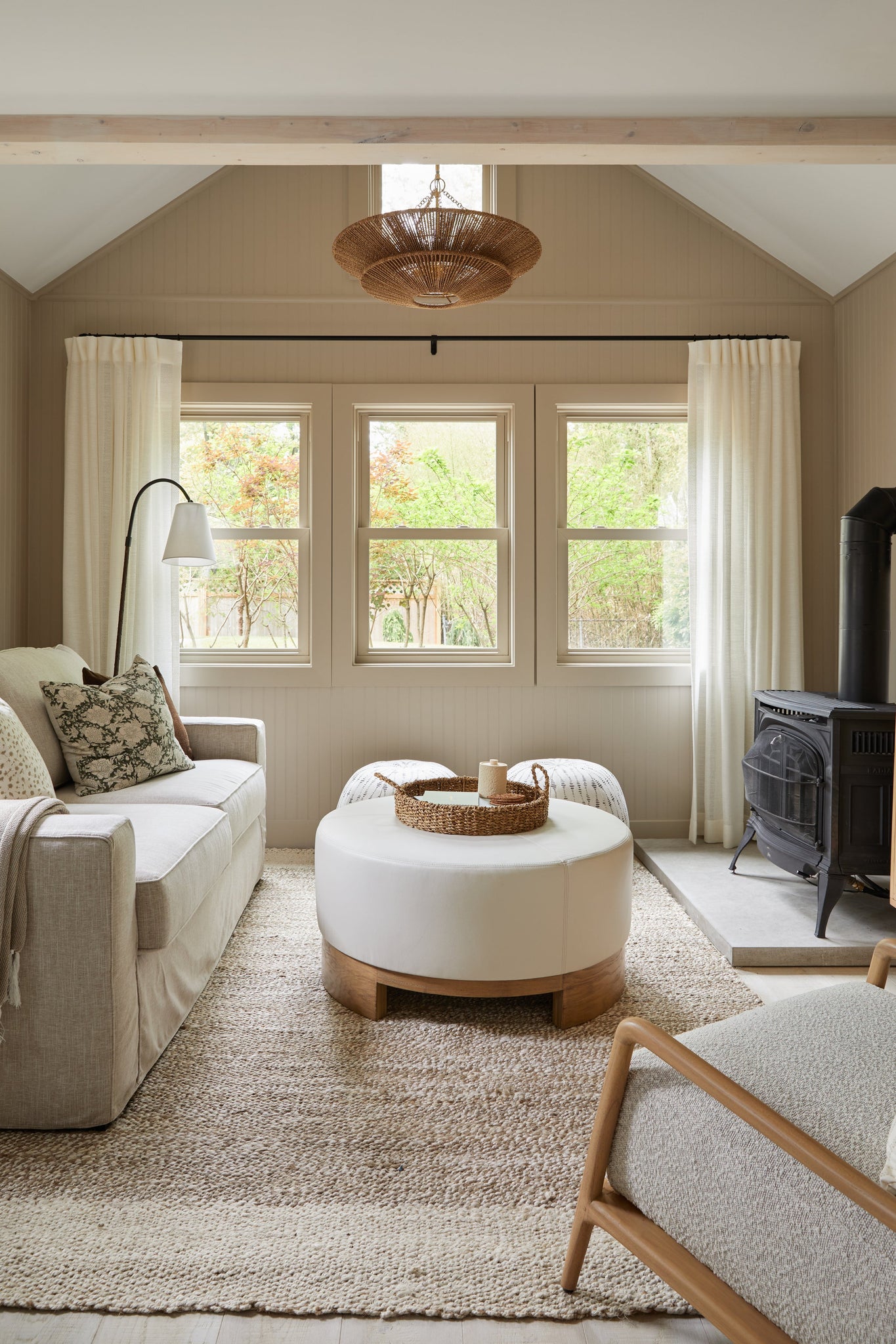 Tropea Chandelier styled in an elegant dining room for warm, layered light at Laurie Yapp Home.