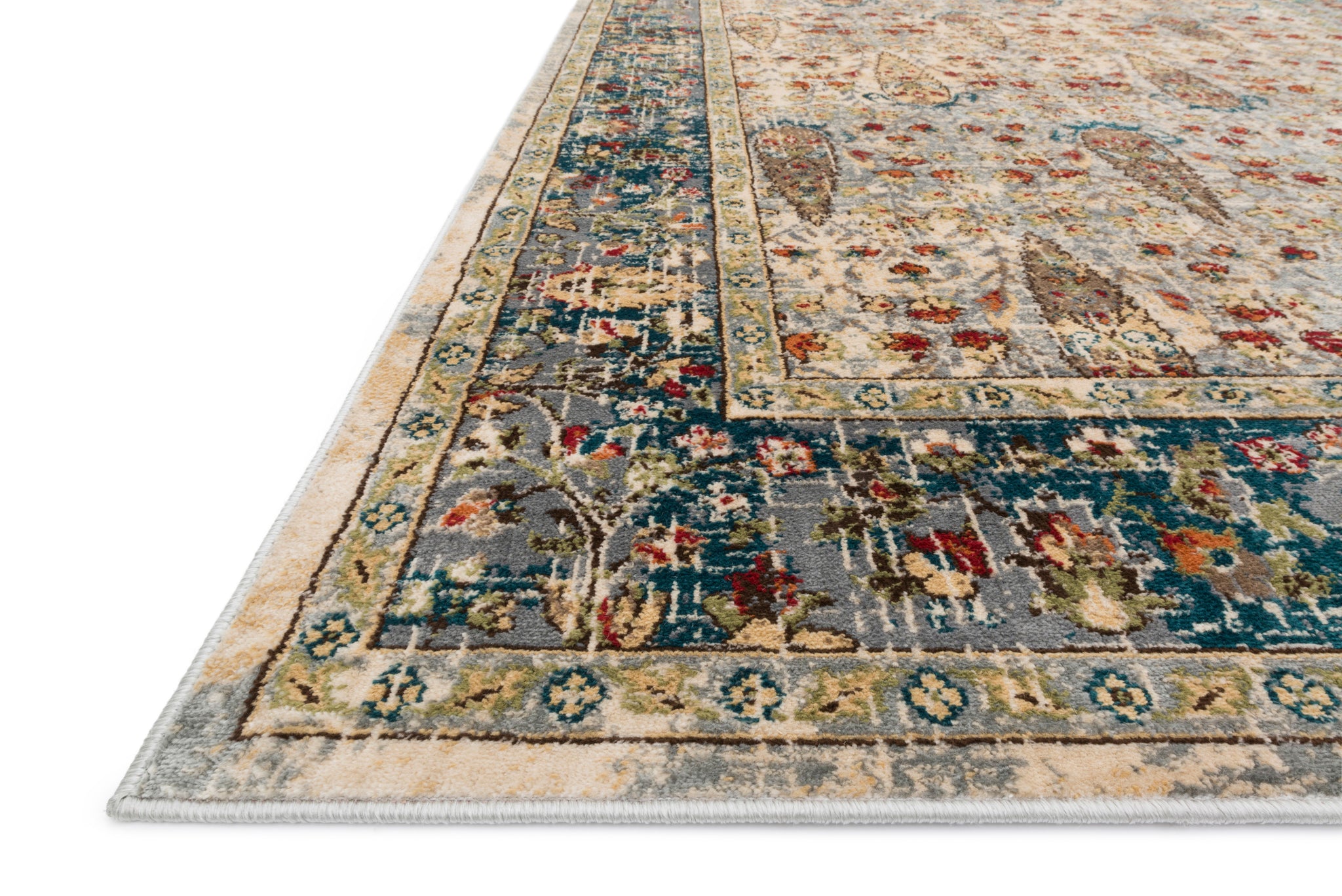 Side view of the Isadora Sand / Steel rug.