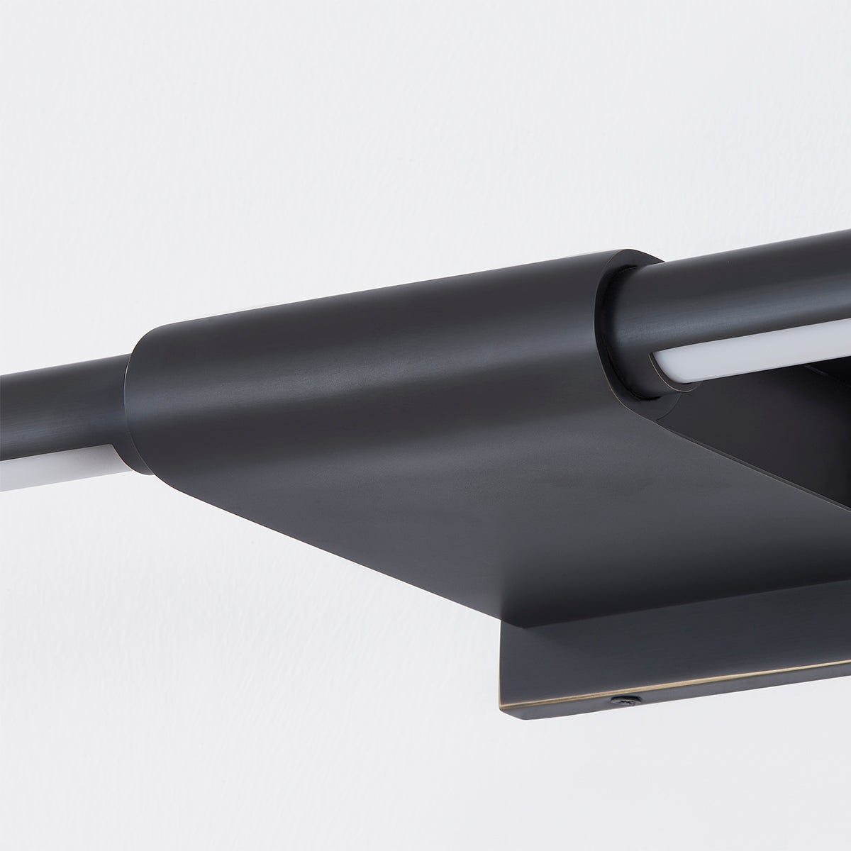 Close-up of the Jerome Picture Light 22.25" in bronze showing the arm curve and shade proportion.