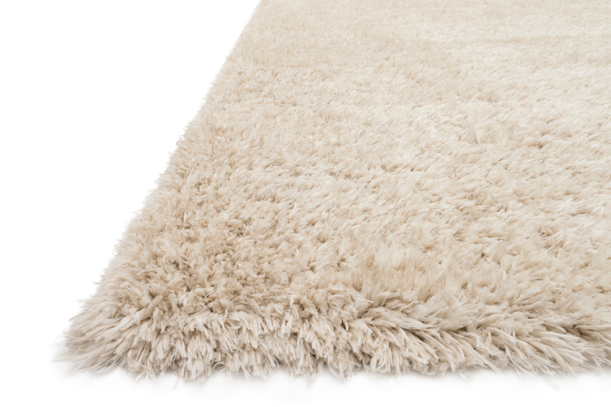 Kayla Shag Beige styled in a living room at Laurie Yapp Home.