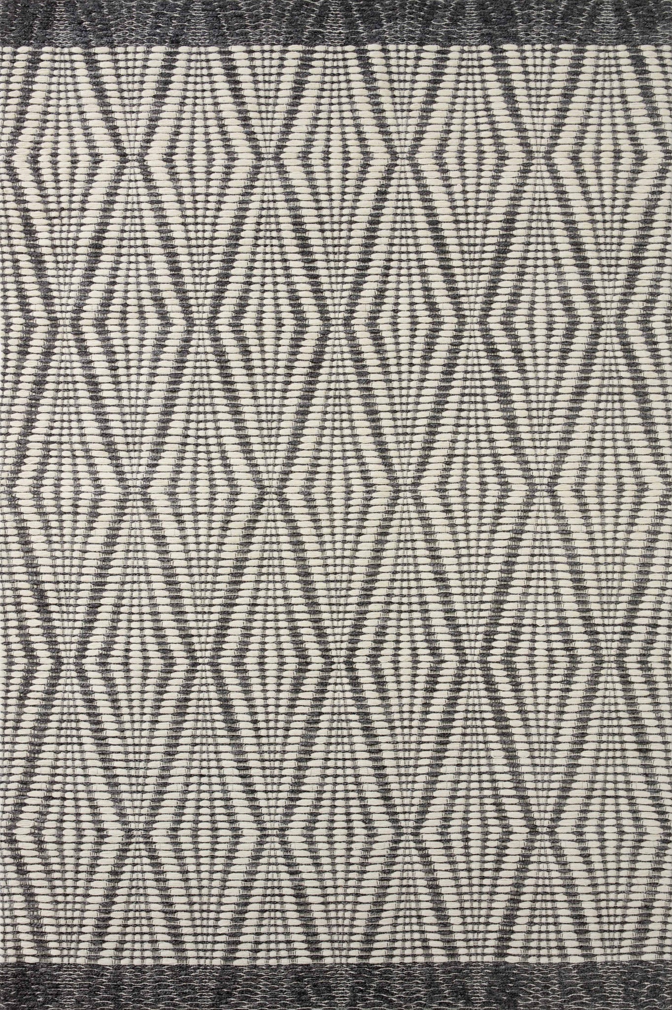 Kenzie Ivory / Charcoal β a Loloi rug at Laurie Yapp Home.