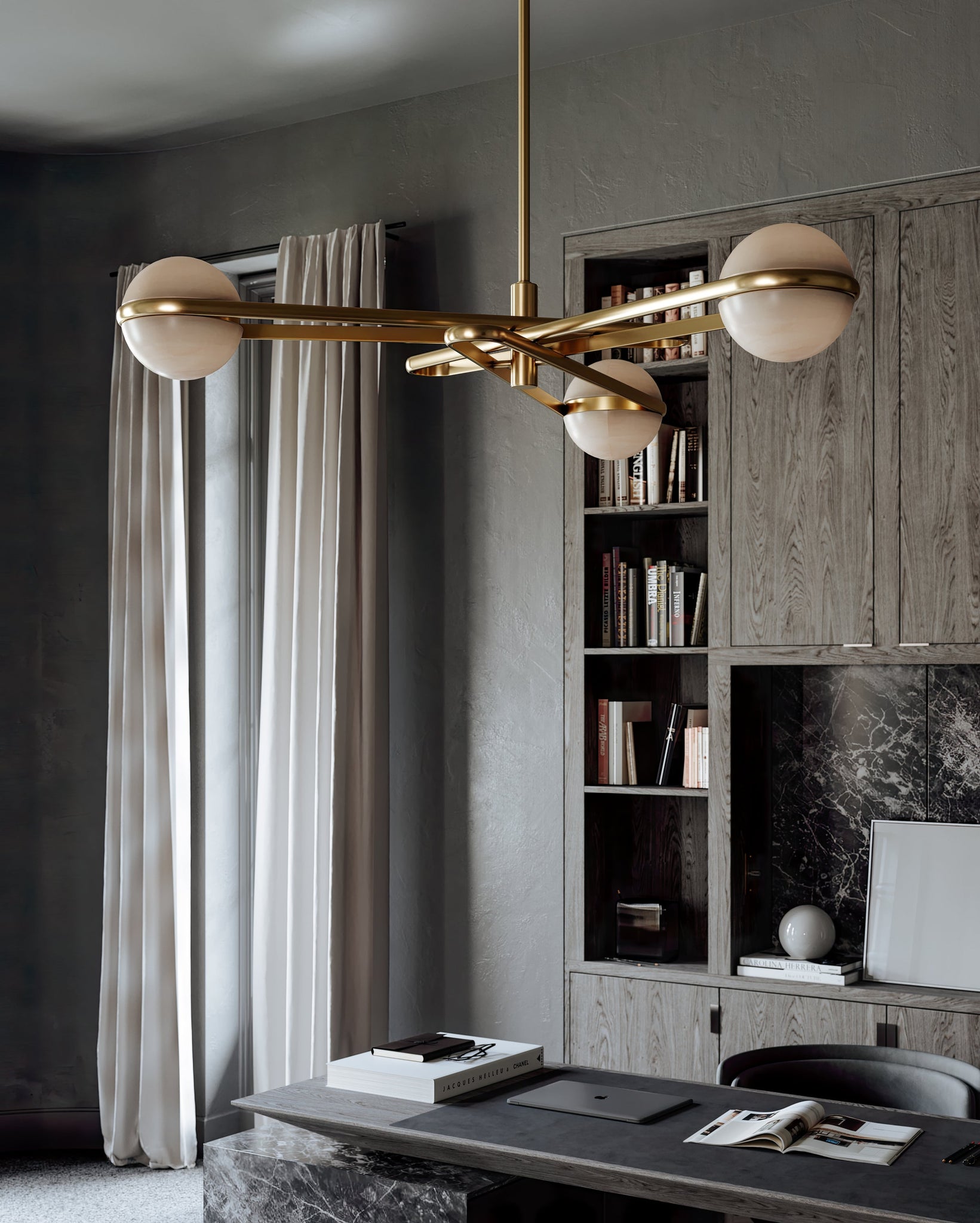 Kyomi Chandelier styled in a two-story entry for warm, layered light at Laurie Yapp Home.