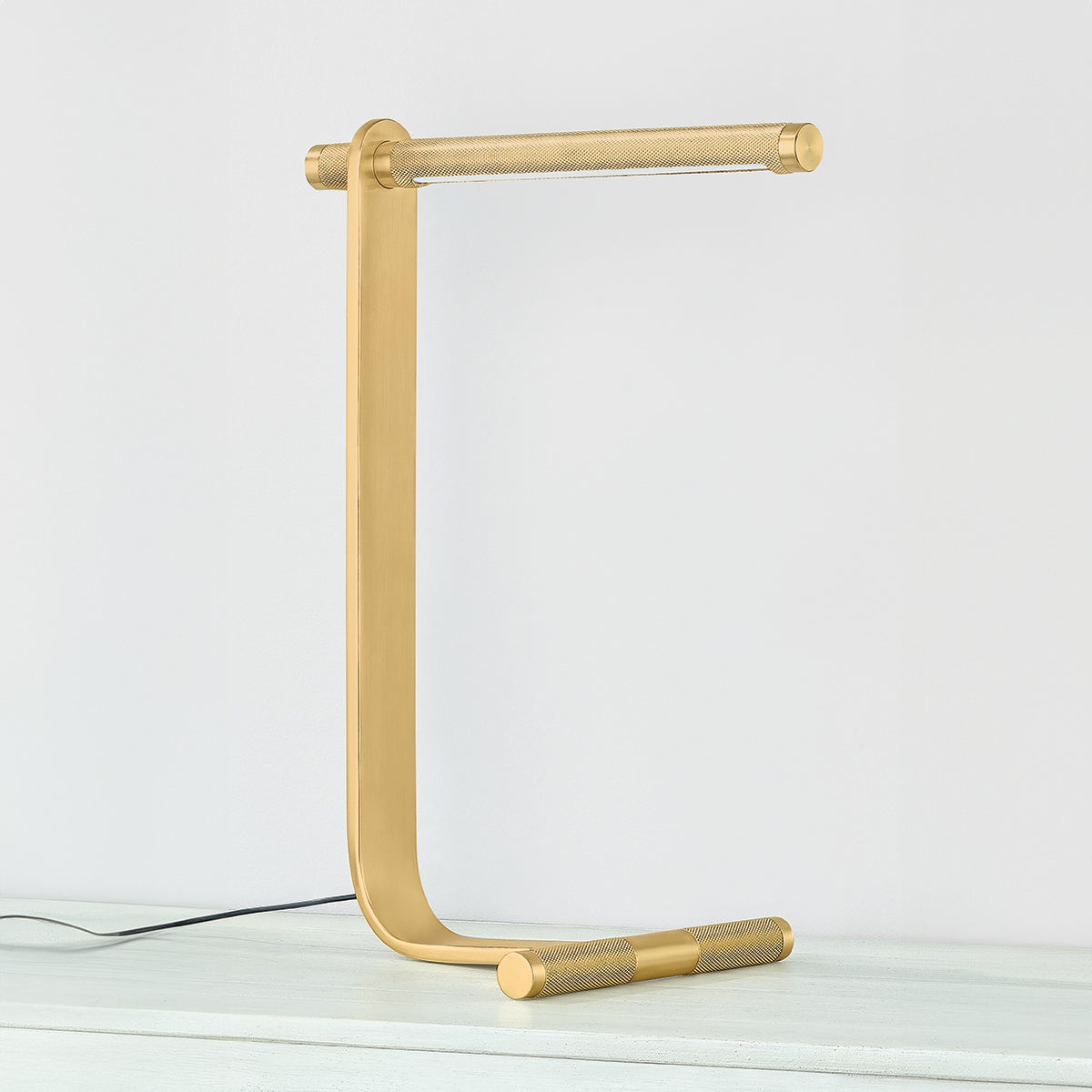 Deptford Table Lamp in aged brass shown from a second angle to highlight the base and shade proportions.