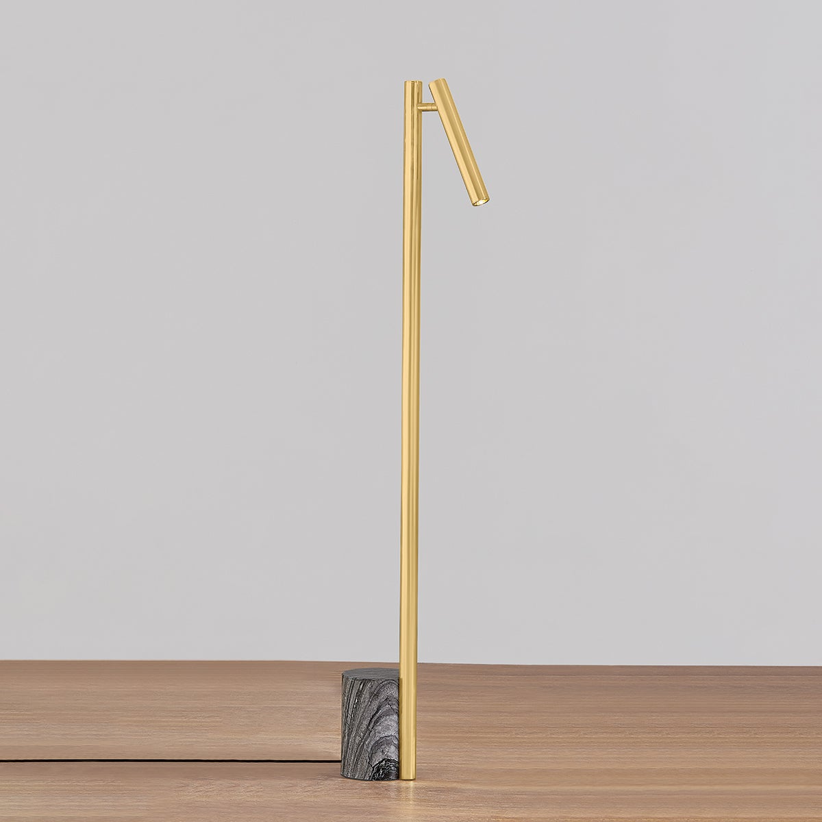 Close-up of the Circleville Floor Lamp in aged brass showing the stem, base, and shade proportions.
