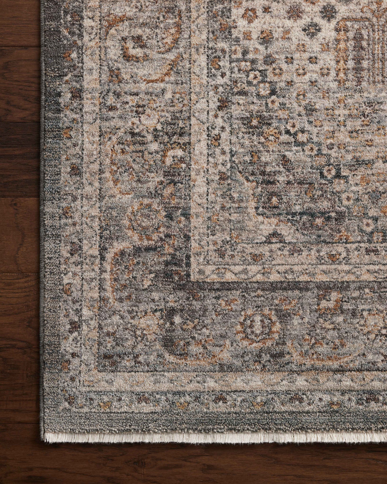 Side view of the Lyra Denim / Pebble rug.