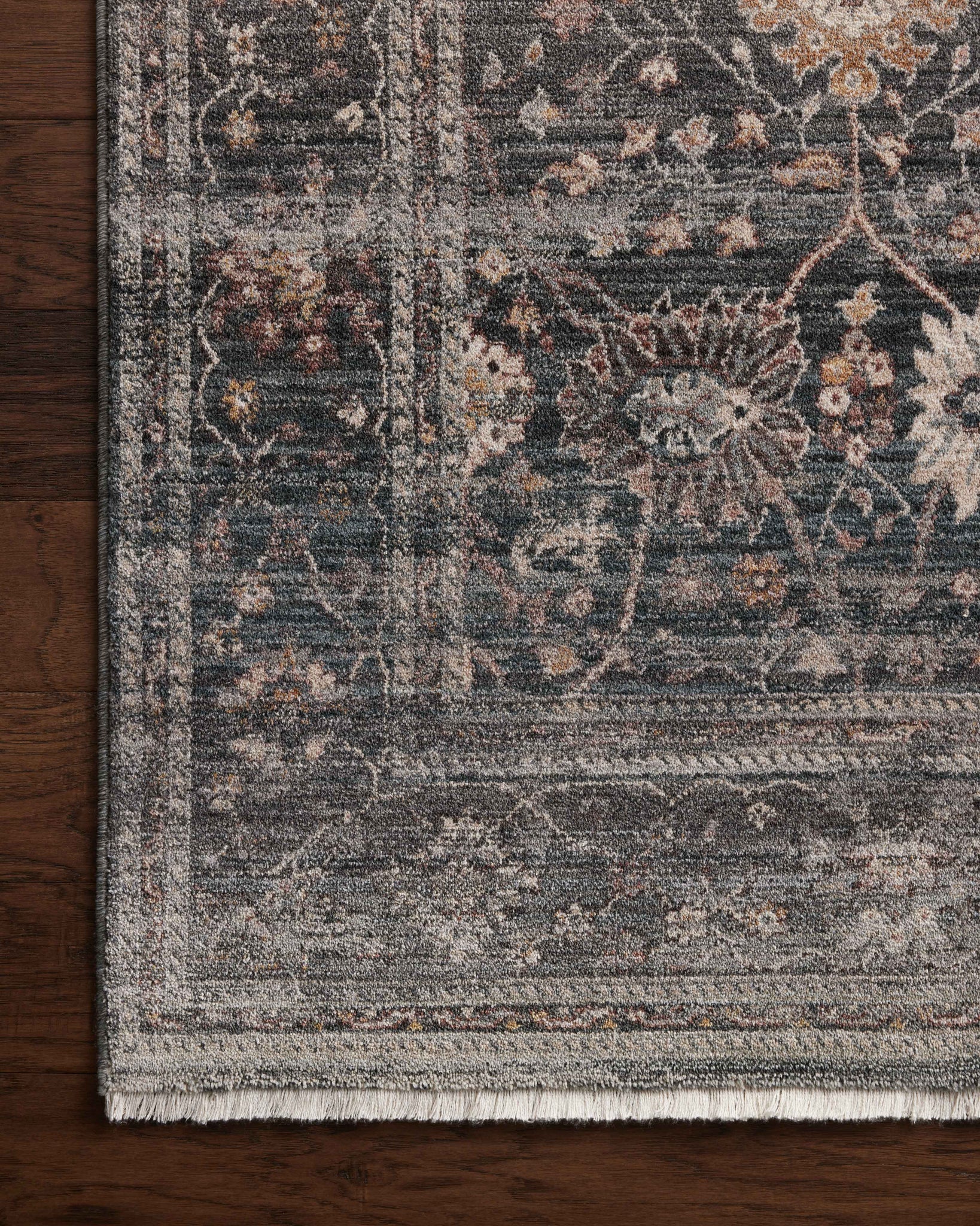 Side view of the Lyra Ink / Multi rug.