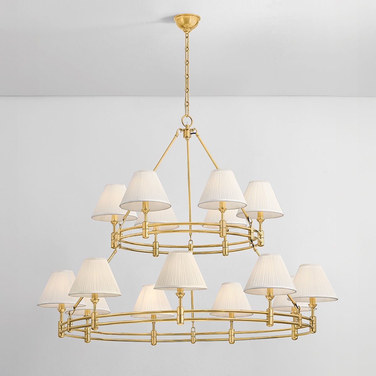 Close-up of the Howard Chandelier 50" x 35.75" in aged brass showing the frame, arms, and shade detail.