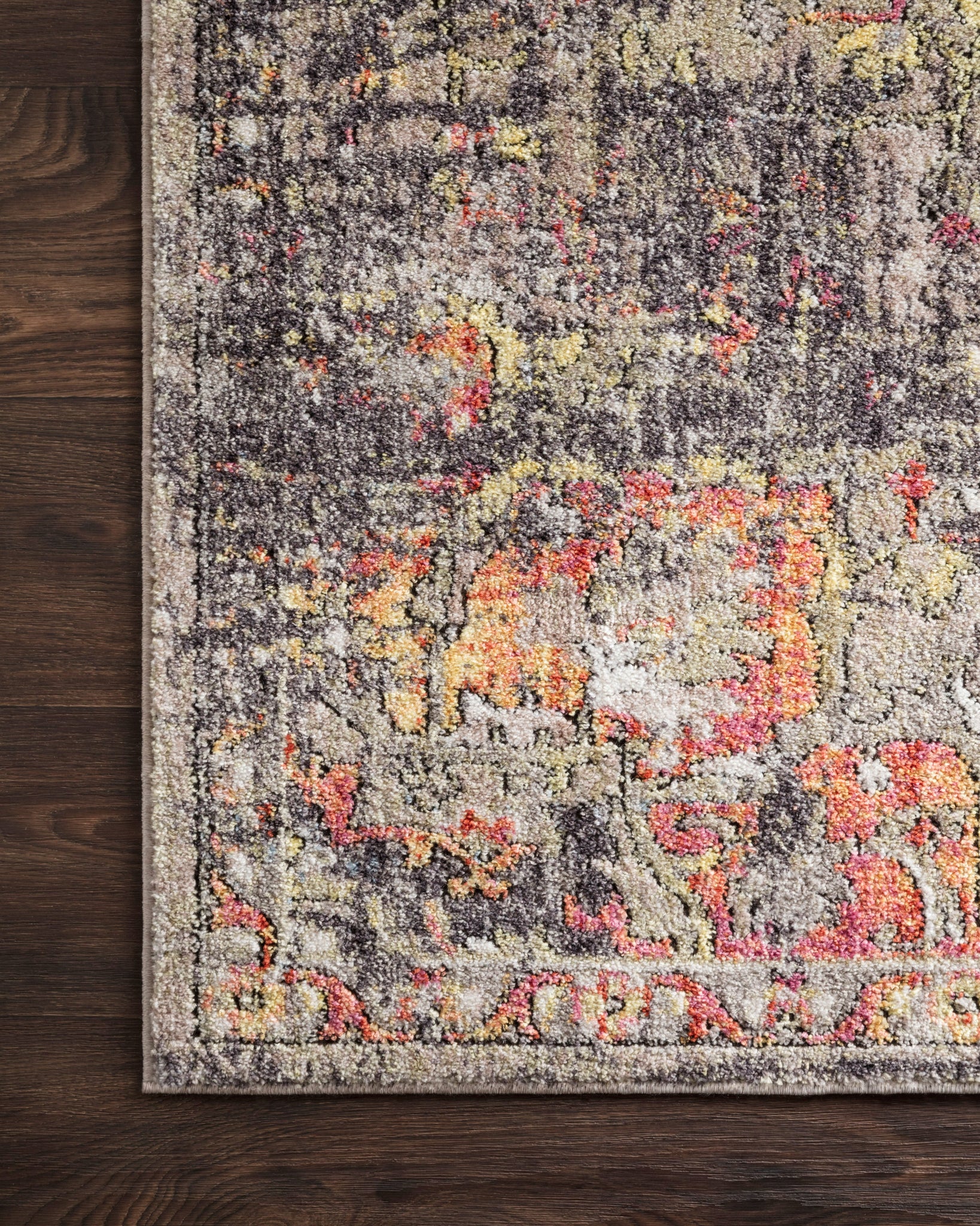 Side view of the Medusa Taupe / Sunset rug.