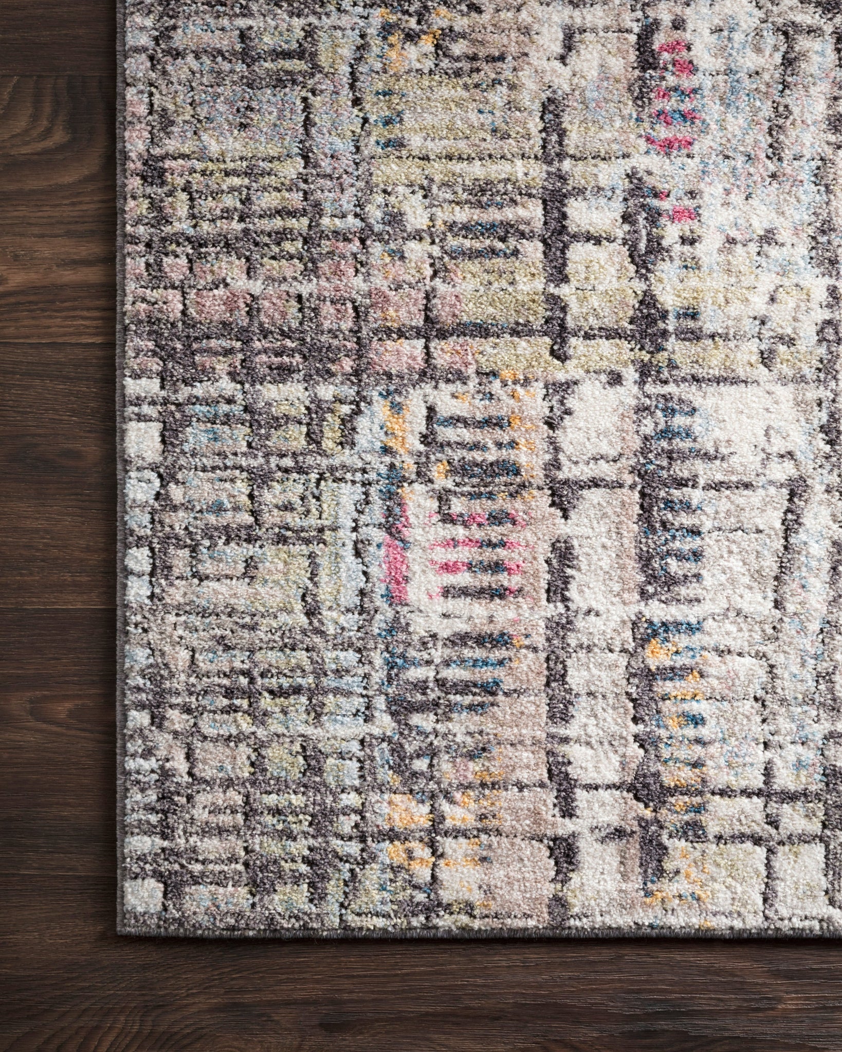Side view of the Medusa Charcoal / Multi rug.