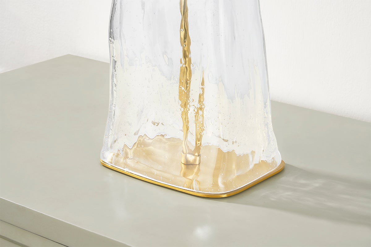 Midura Table Lamp in aged brass shown from a second angle to highlight the base and shade proportions.