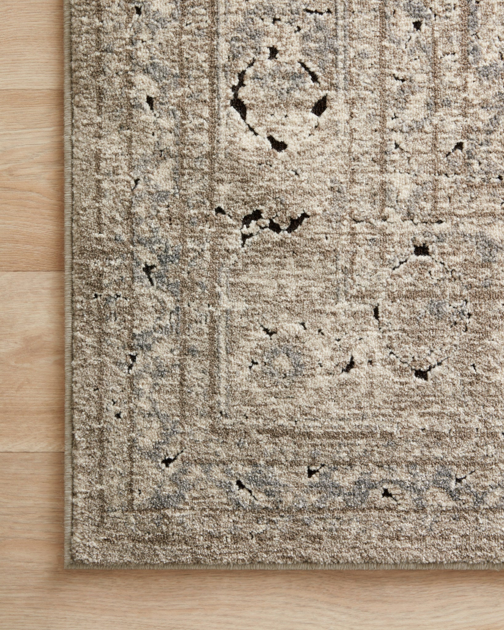 Close-up detail of the Millennium Sand / Ivory showing its pile and weave.