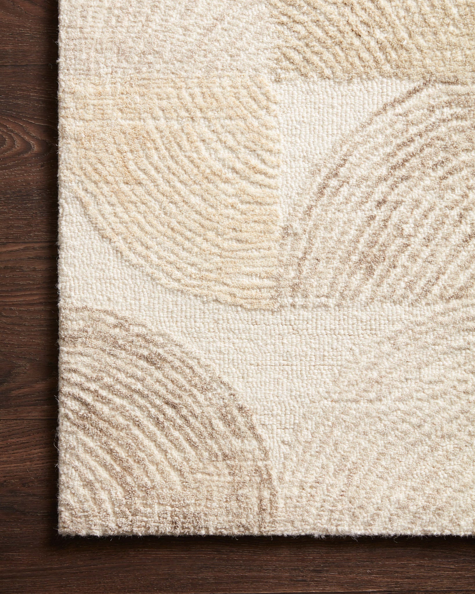Side view of the Milo Pebble / Multi rug.