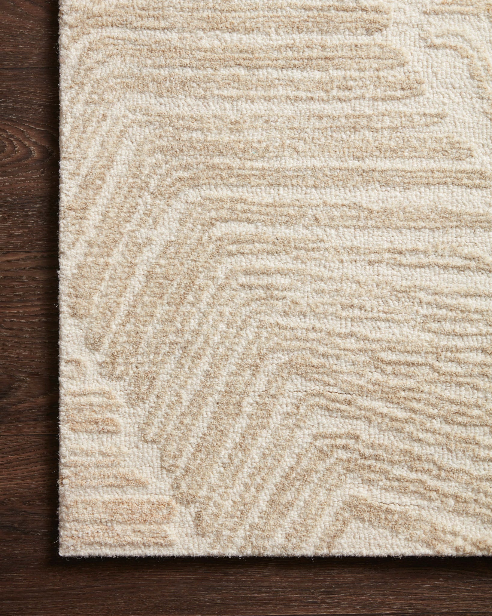 Side view of the Milo Olive / Natural rug.