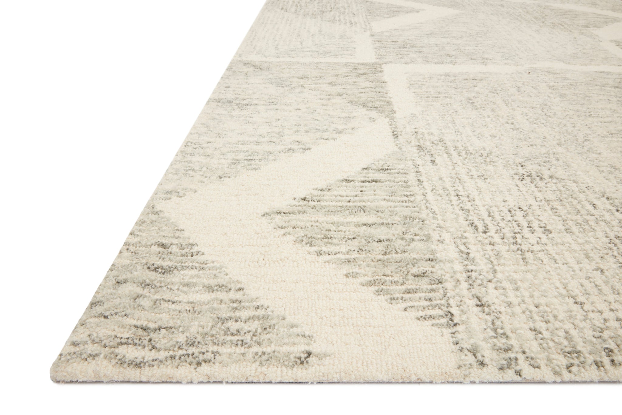 Side view of the Milo Lt Grey / Granite rug.