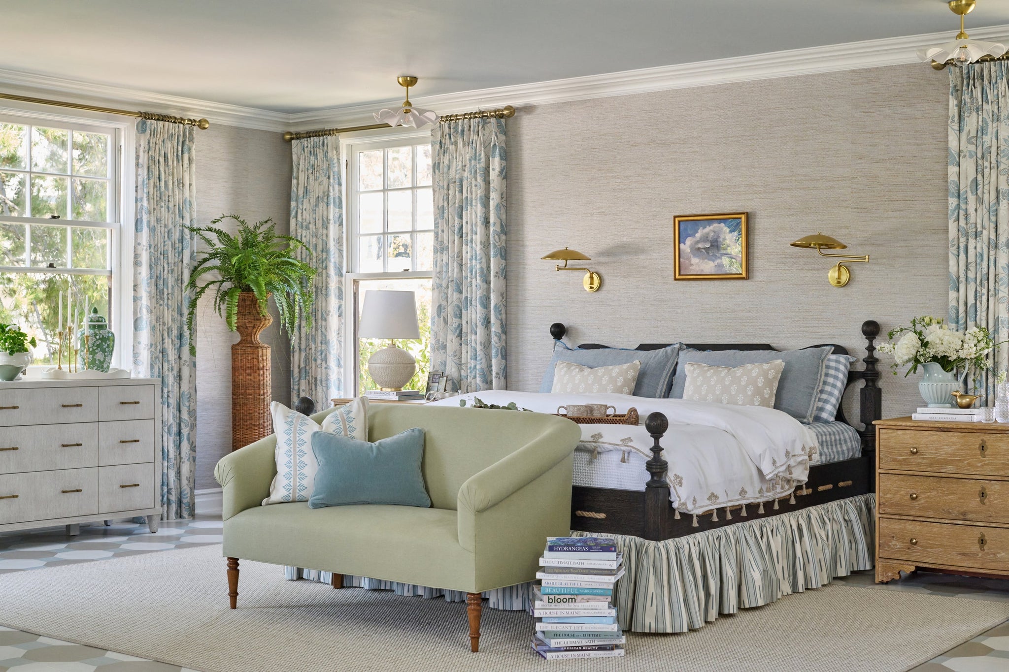 Brockville Wall Sconce in aged brass styled in a curated living room for warm, layered light at Laurie Yapp Home.