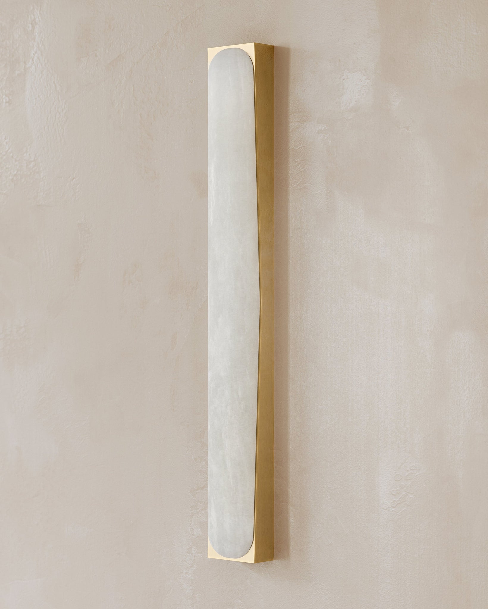 Millie Bath And Vanity 3.25" x 26" styled in a powder room for warm, layered light at Laurie Yapp Home.