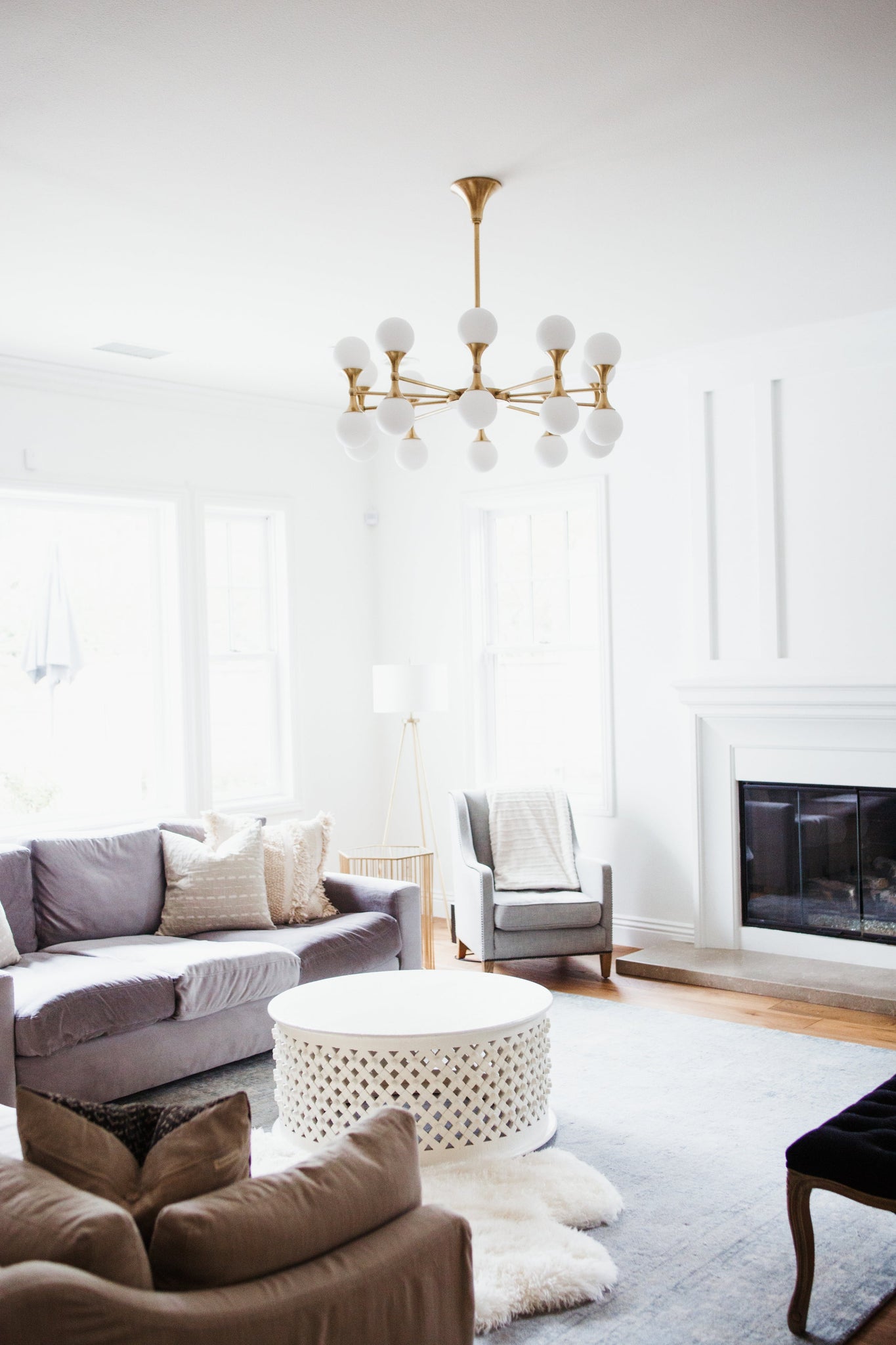 Astoria Chandelier 36" in aged brass shown from a second angle to highlight the frame, arms, and shade detail.