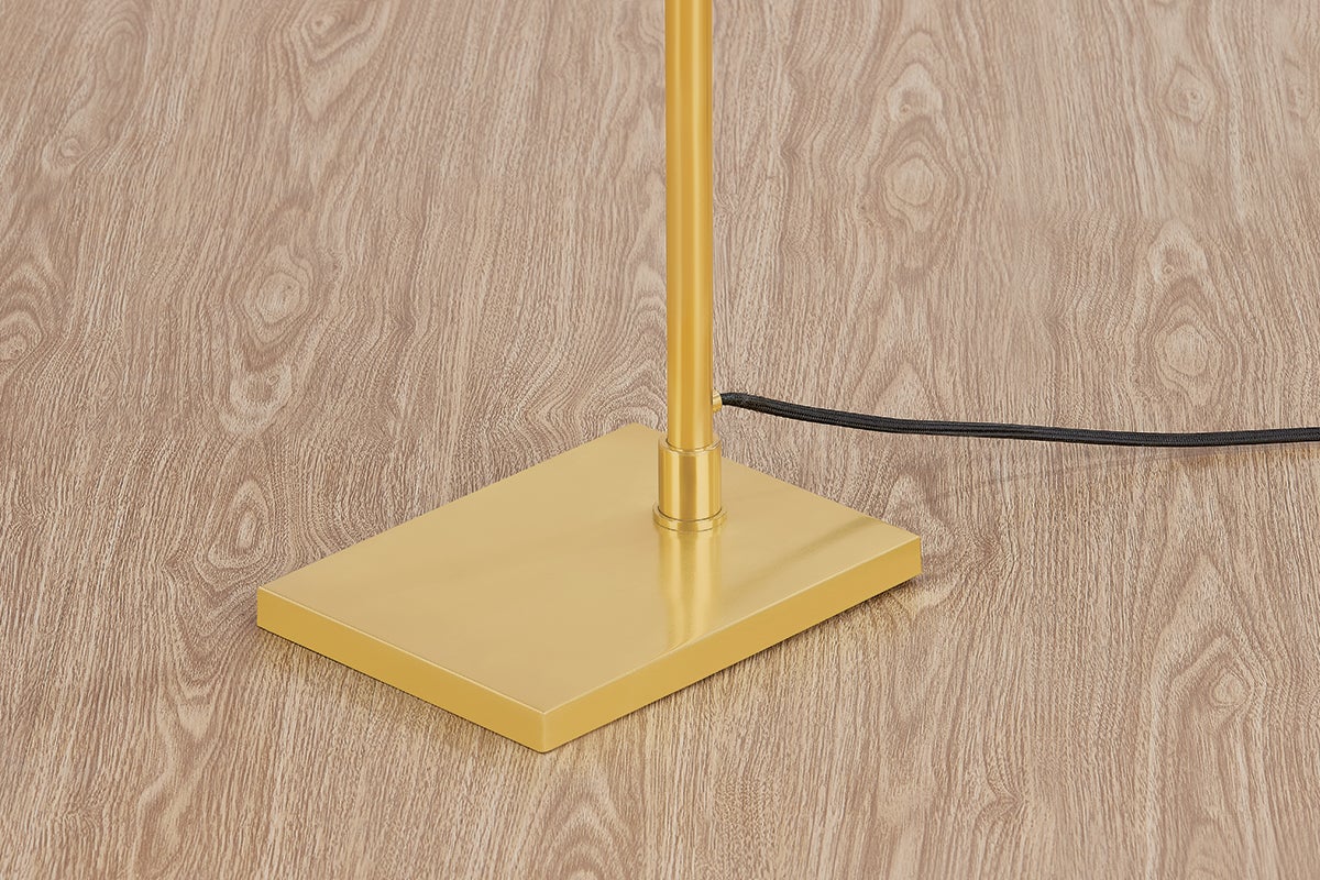 Close-up of the Narragansett Floor Lamp in aged brass showing the stem, base, and shade proportions.