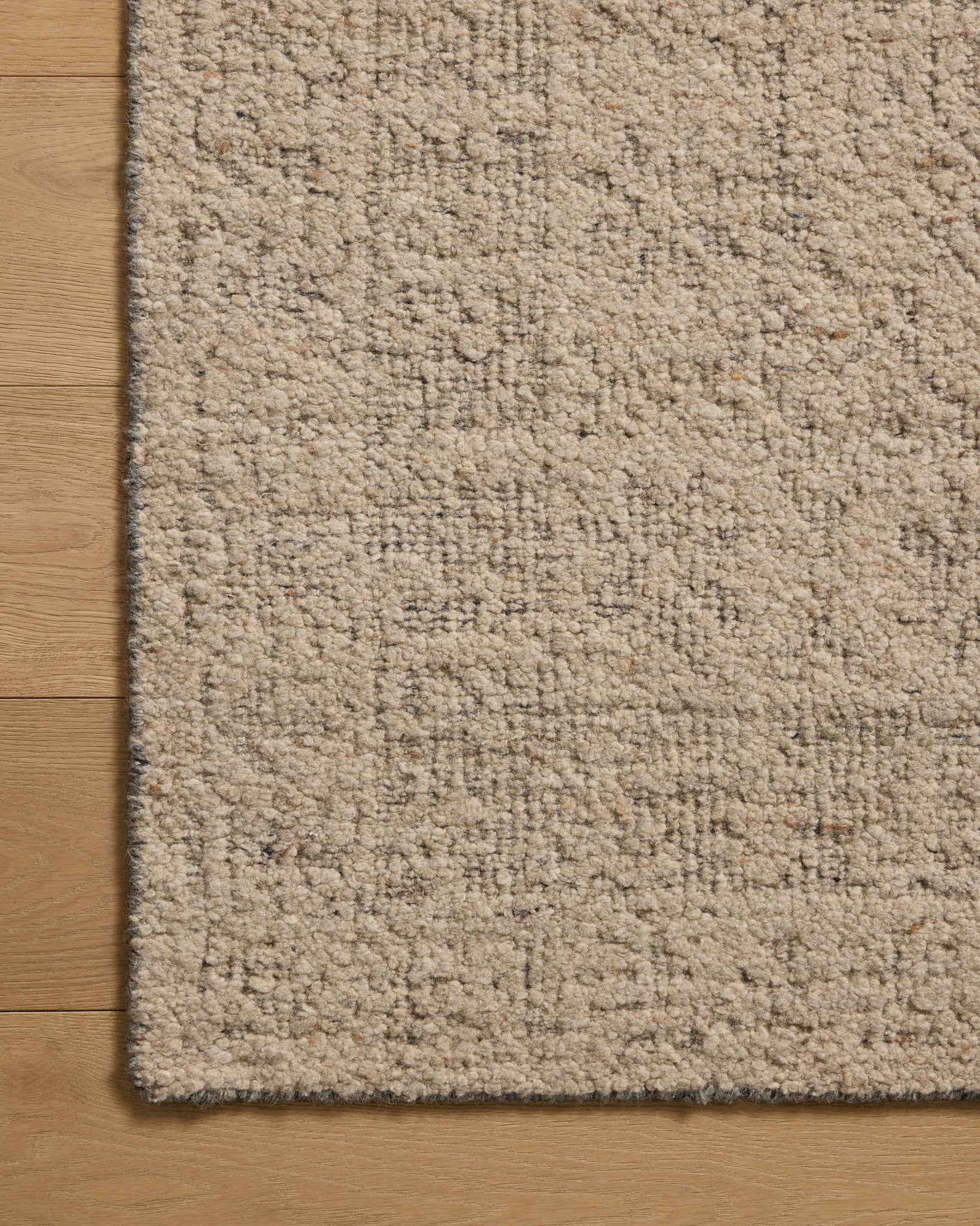 Novi Oatmeal / Grey shown from a different angle to reveal its pattern.