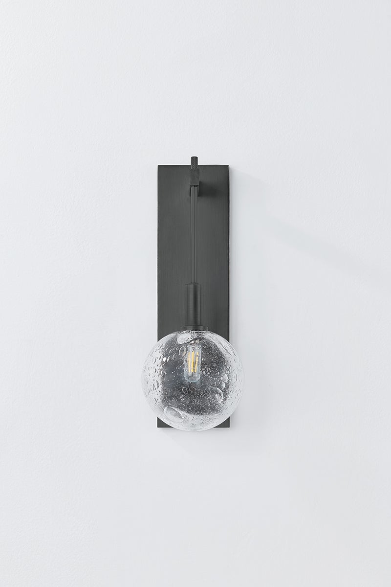 Close-up of the Onteora Wall Sconce in dark bronze showing the arm curve and shade silhouette.