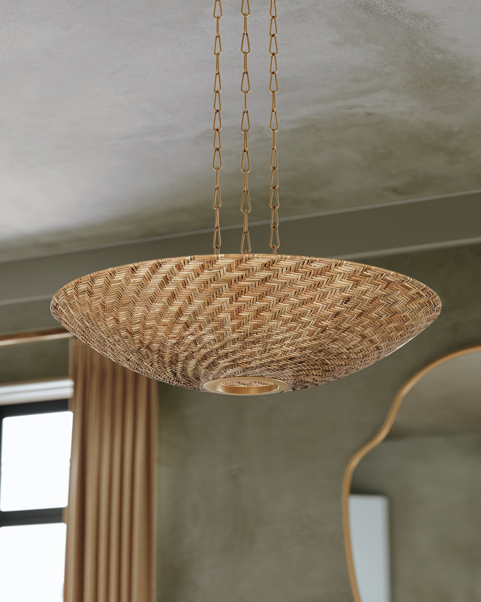 Ollie Chandelier styled in an elegant dining room for warm, layered light at Laurie Yapp Home.