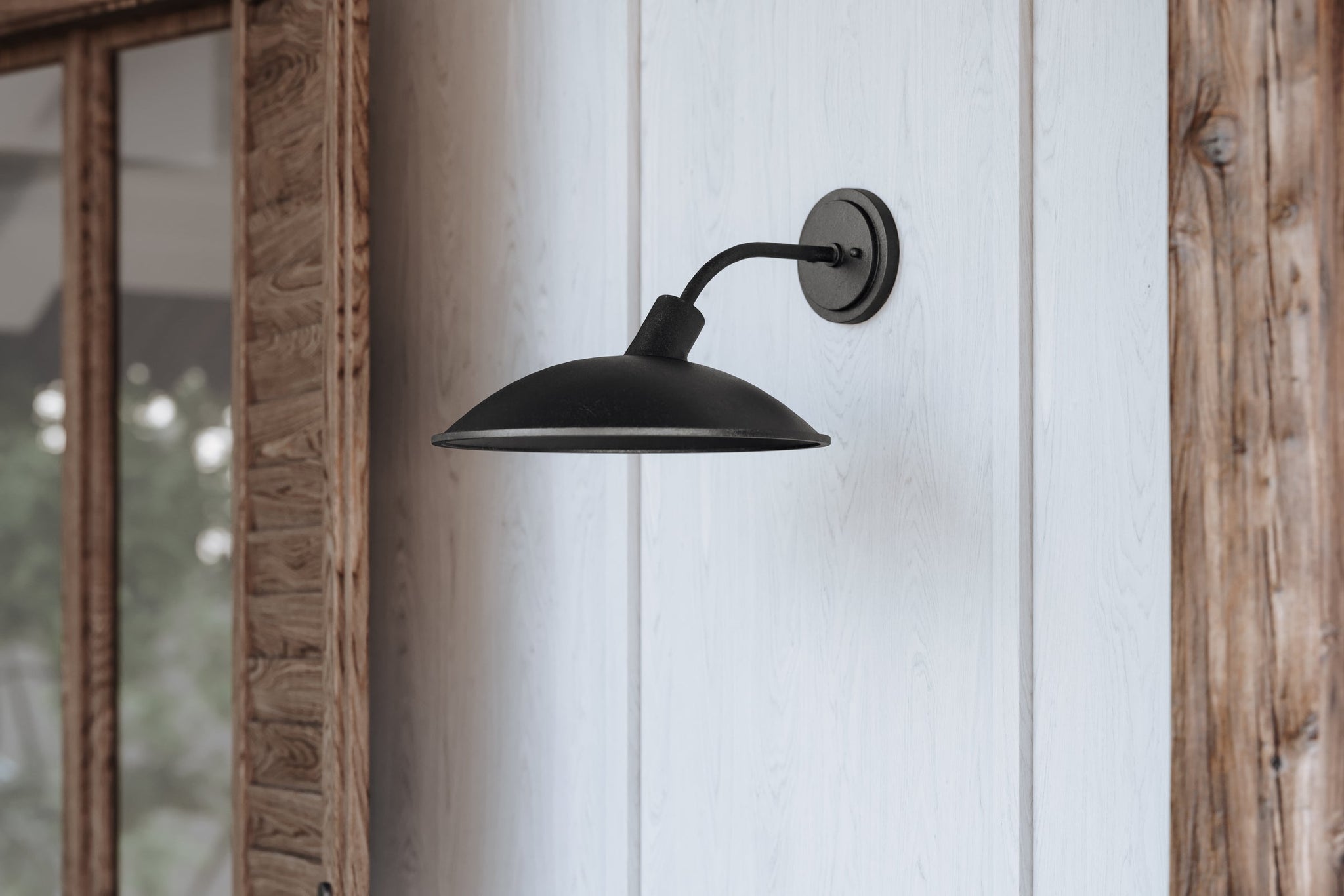 Otis Exterior Wall Sconce 15.5" x 10.75" styled in a modern bathroom for warm, layered light at Laurie Yapp Home.