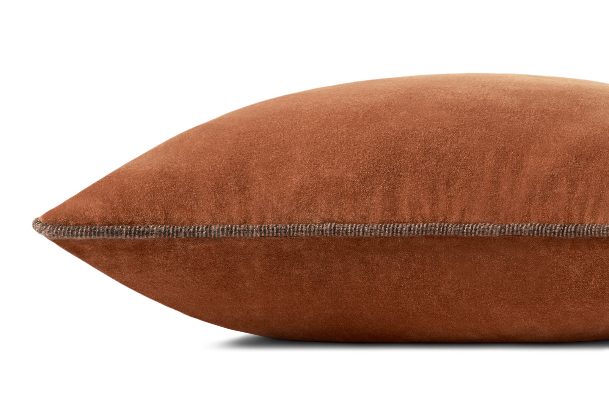 Liza Rust Pillow shown from a different angle to reveal its pattern.