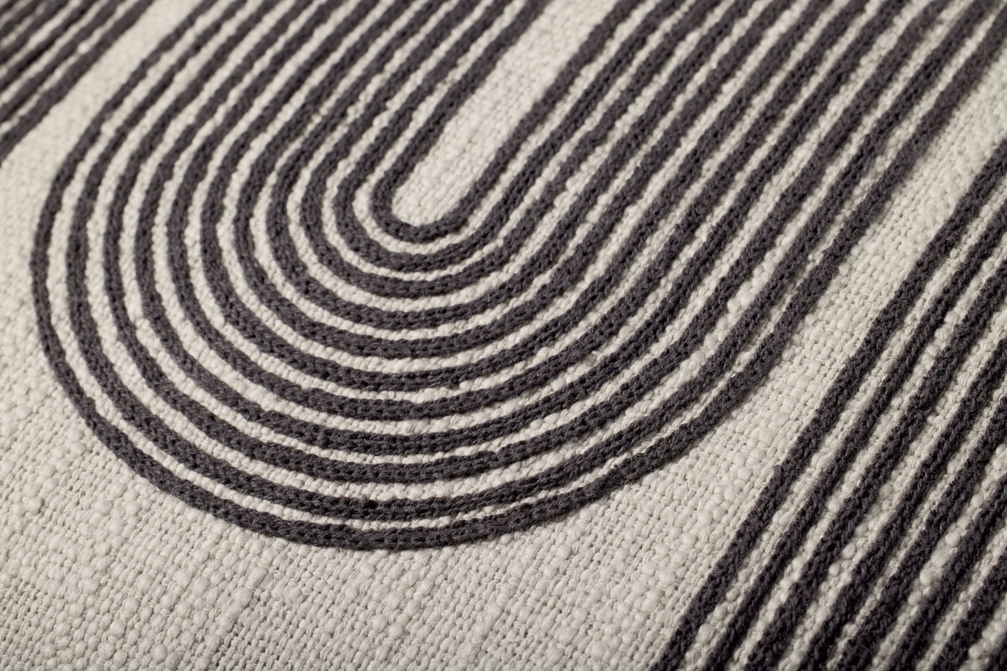 Black / Grey Pillow shown from a different angle to reveal its pattern.