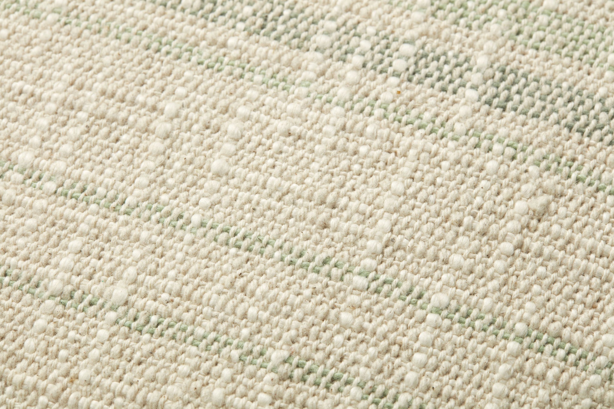 Forrest Ivory / Sage Pillow shown from a different angle to reveal its pattern.
