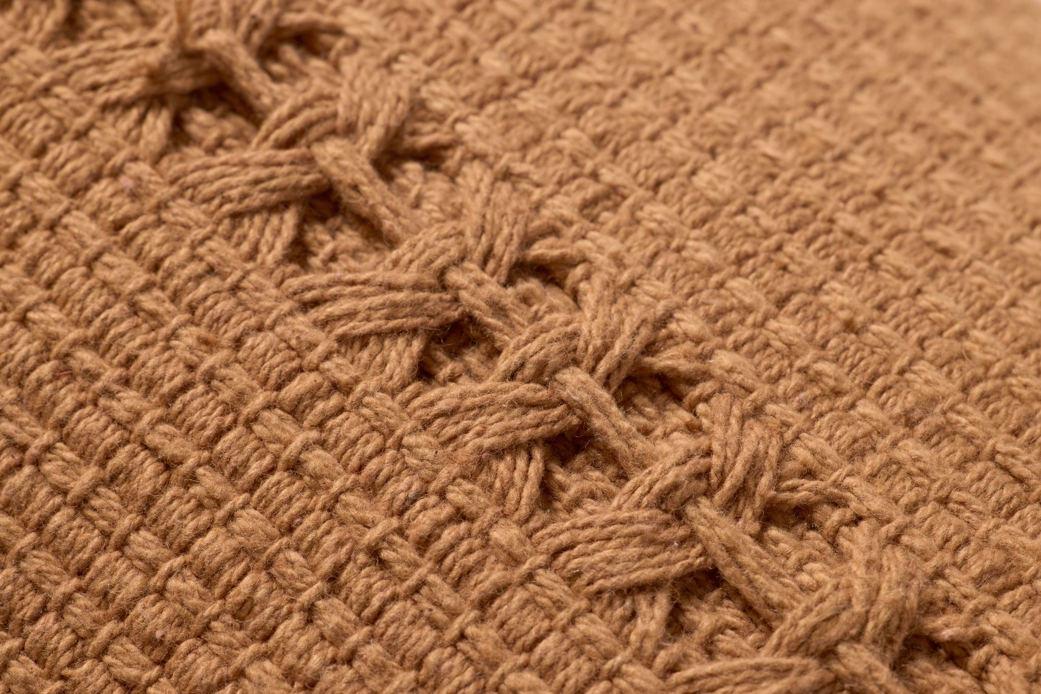 Harvey Orange Pillow shown from another angle.