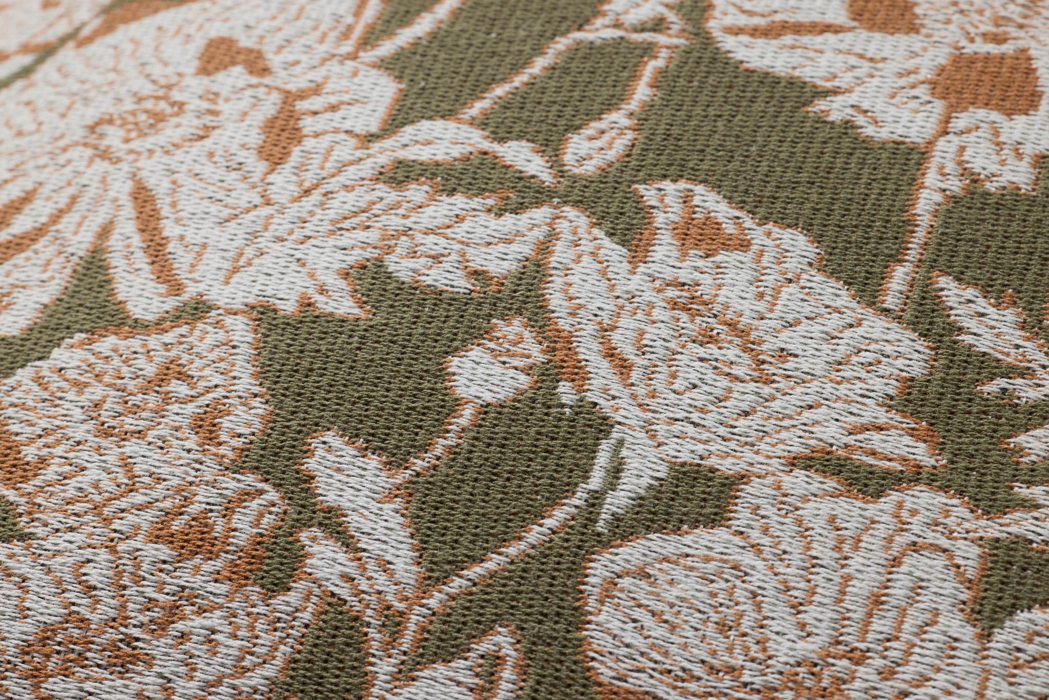 Matilda Olive / Orange Pillow shown from a different angle to reveal its pattern.