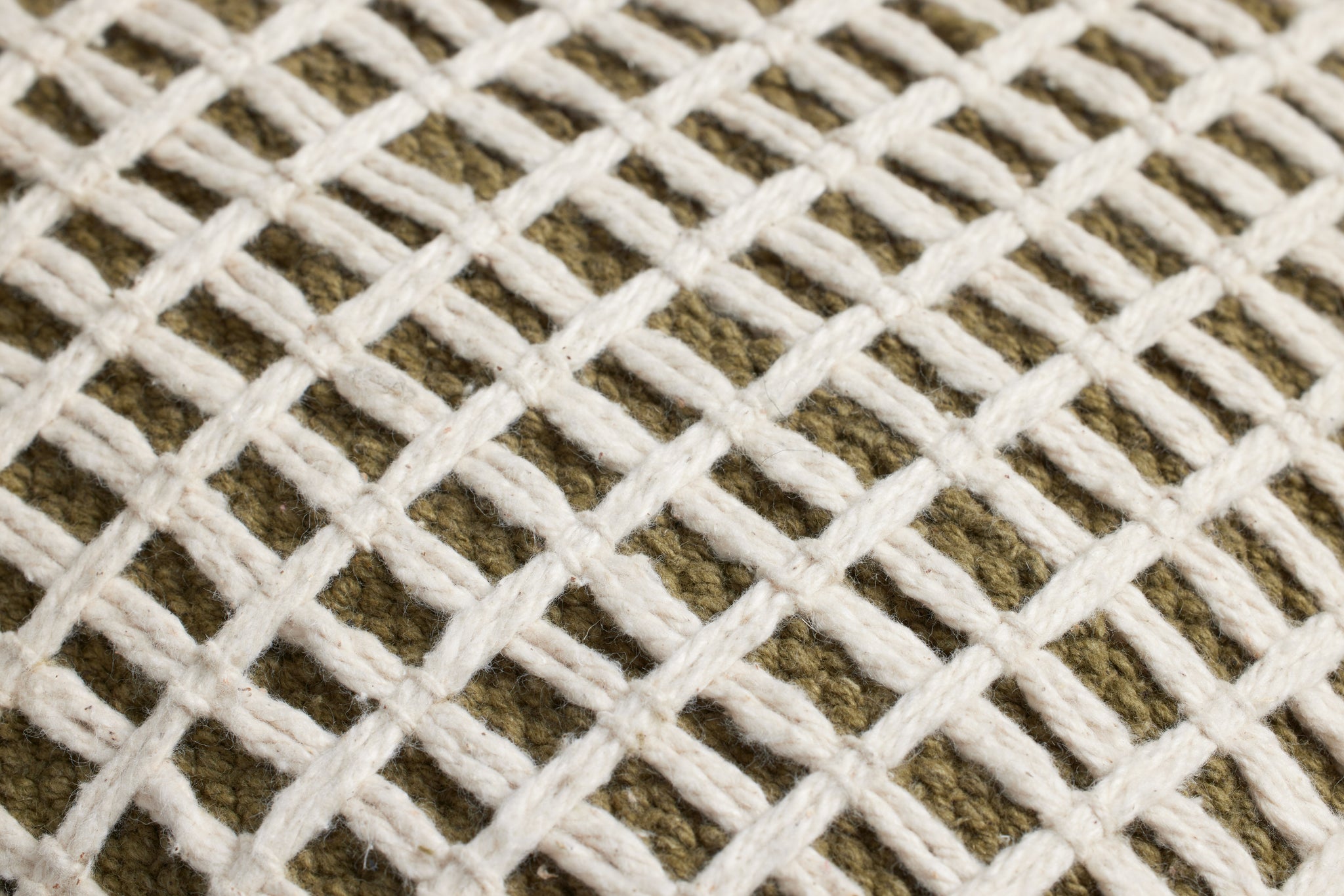 Green / Ivory Pillow shown from a different angle to reveal its pattern.