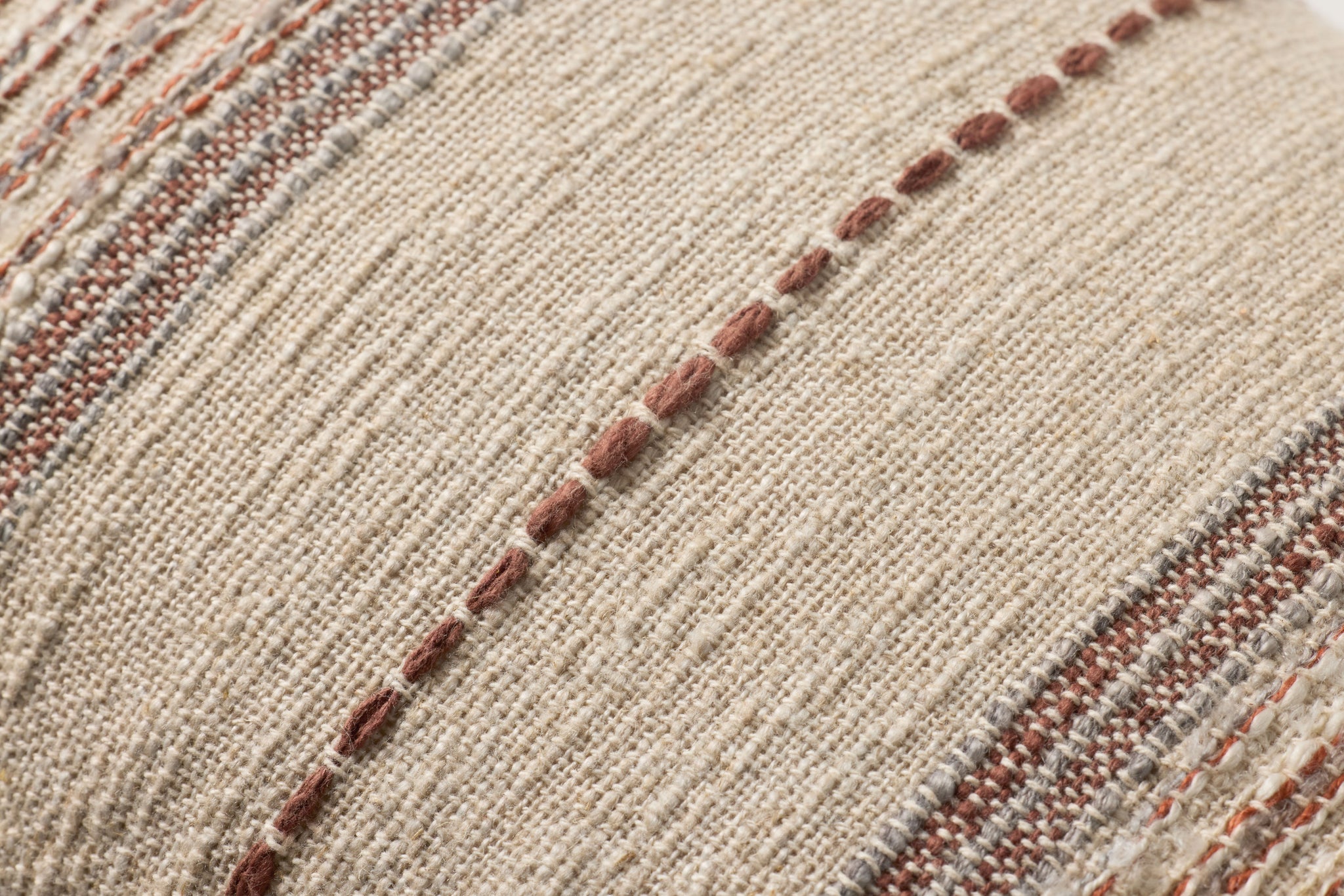Ivory / Multi Pillow (Pattern 1) shown from a different angle to reveal its pattern.