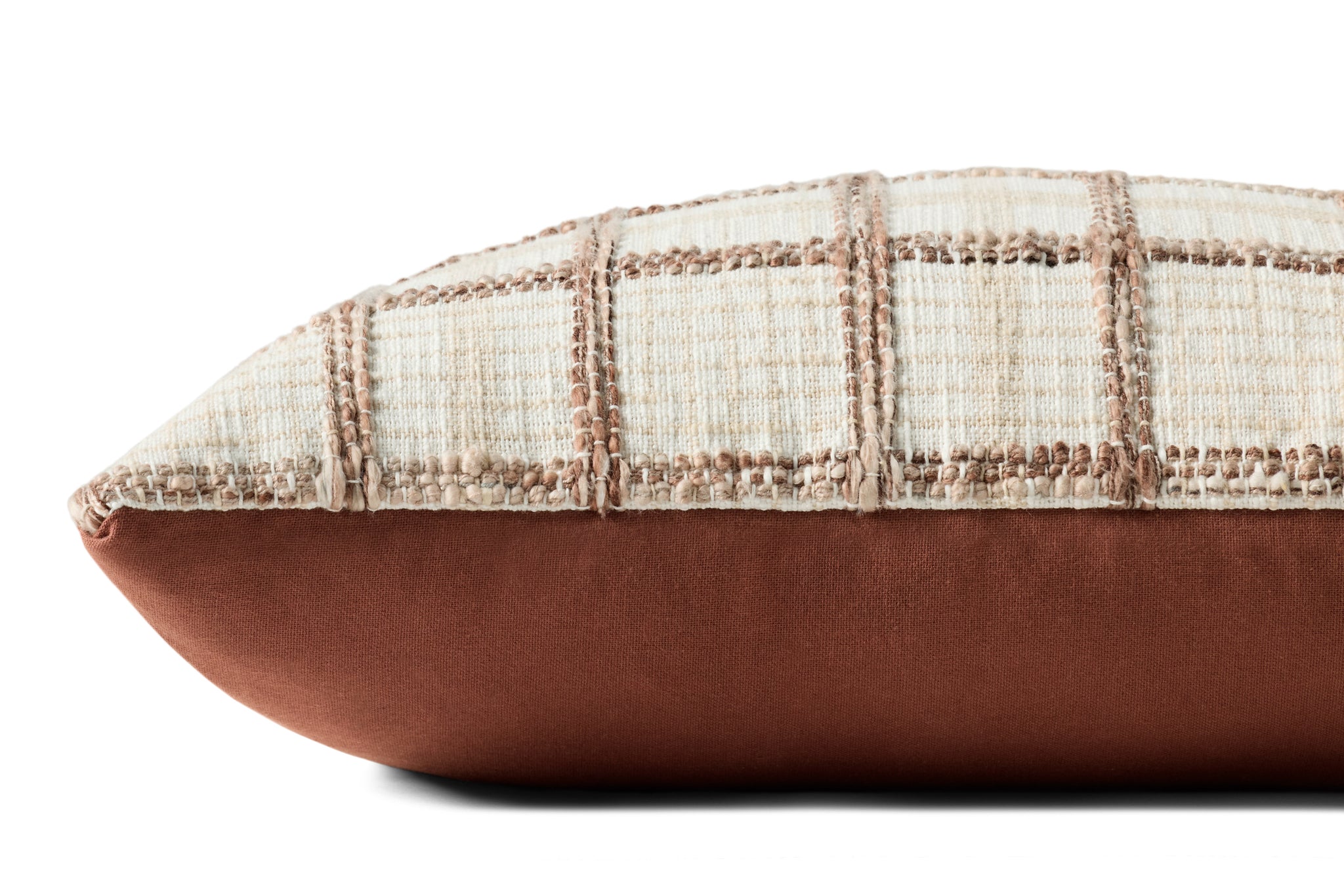 Norman Ivory / Brown Pillow shown from a different angle to reveal its pattern.