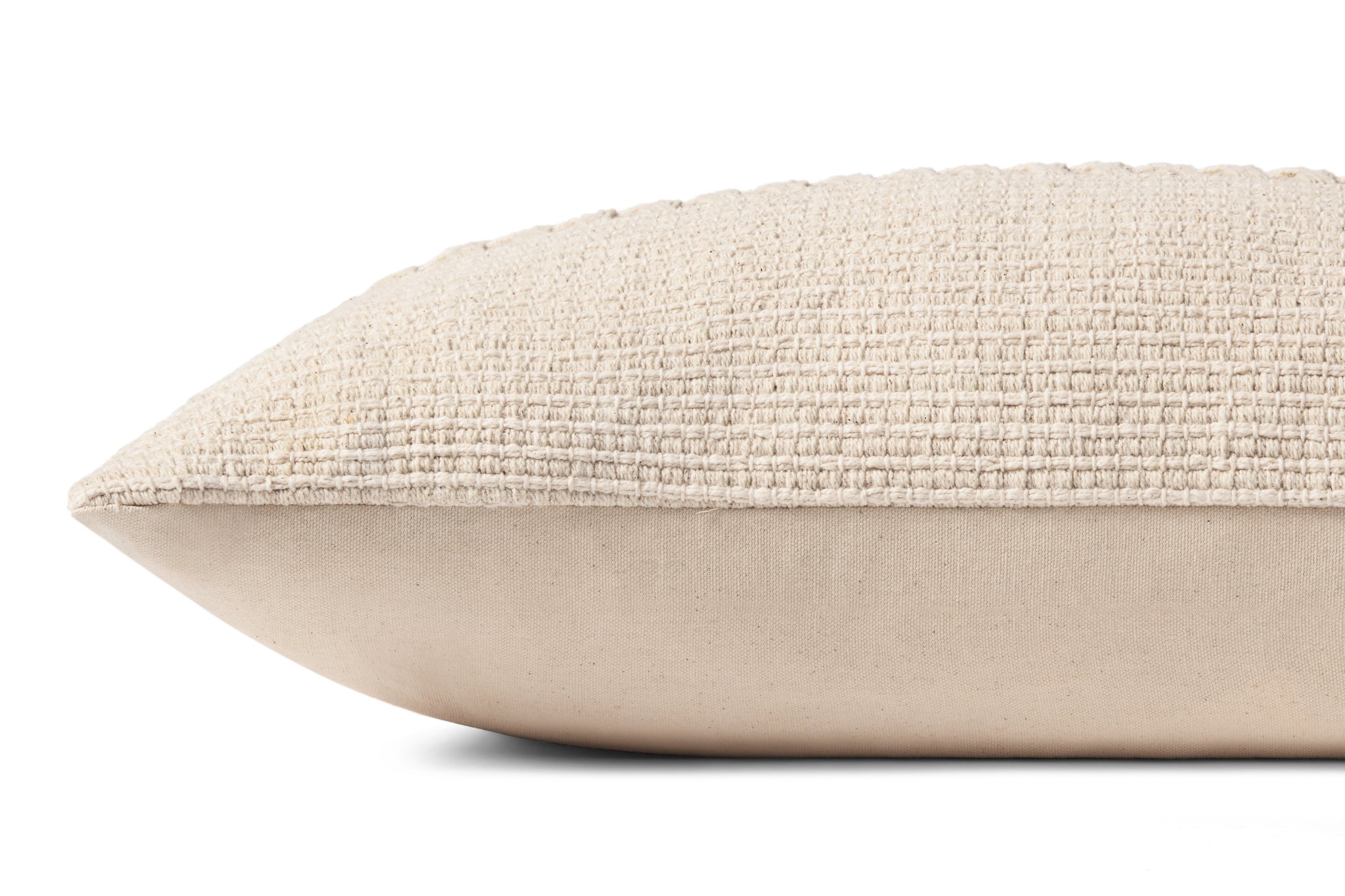 Harvey Ivory Pillow shown from a different angle to reveal its pattern.