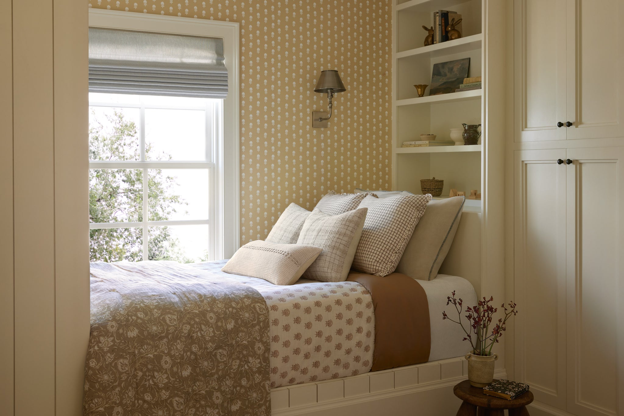 Harvey Ivory Pillow shown from a different angle to reveal its pattern.