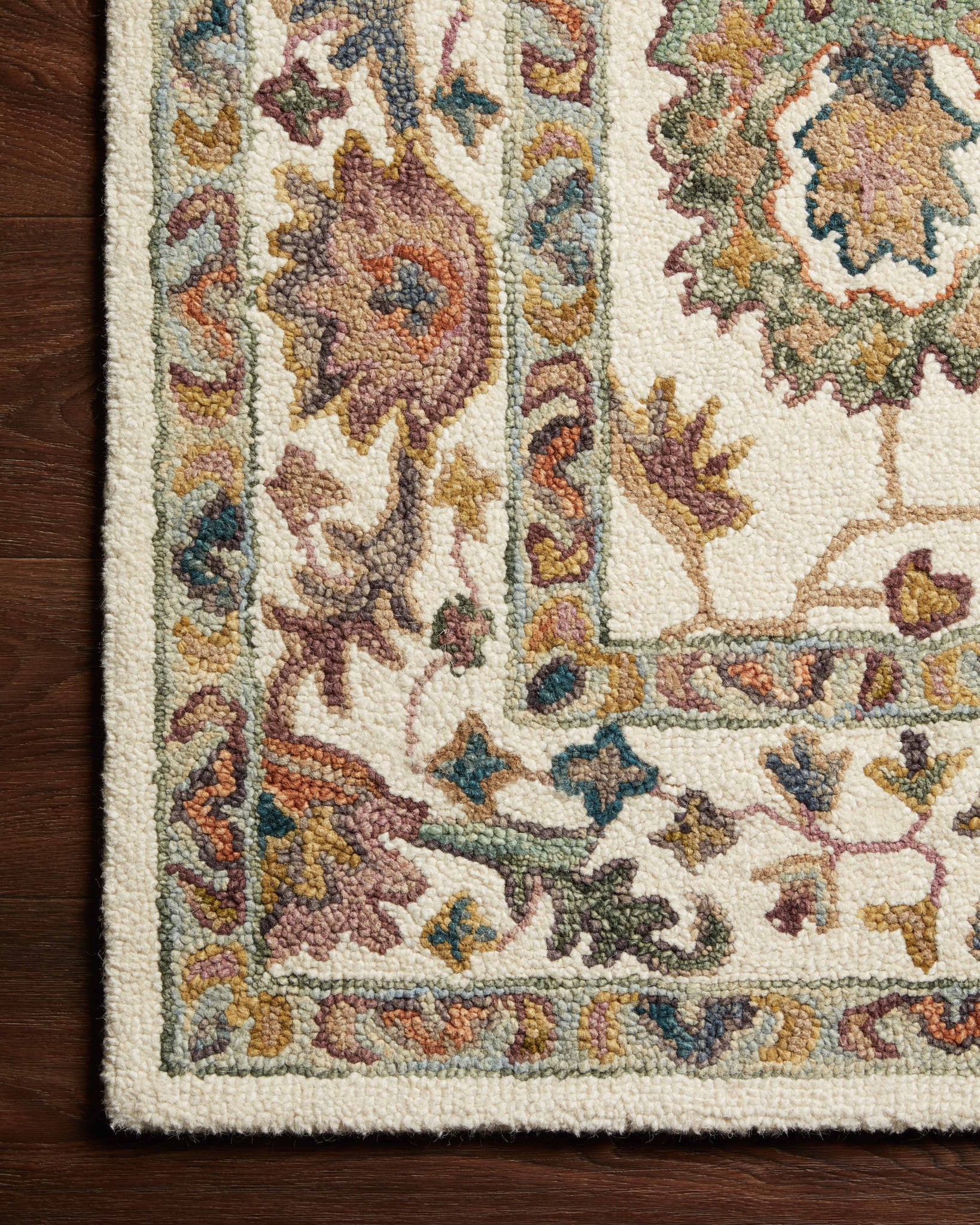 Side view of the Padma White / Multi rug.