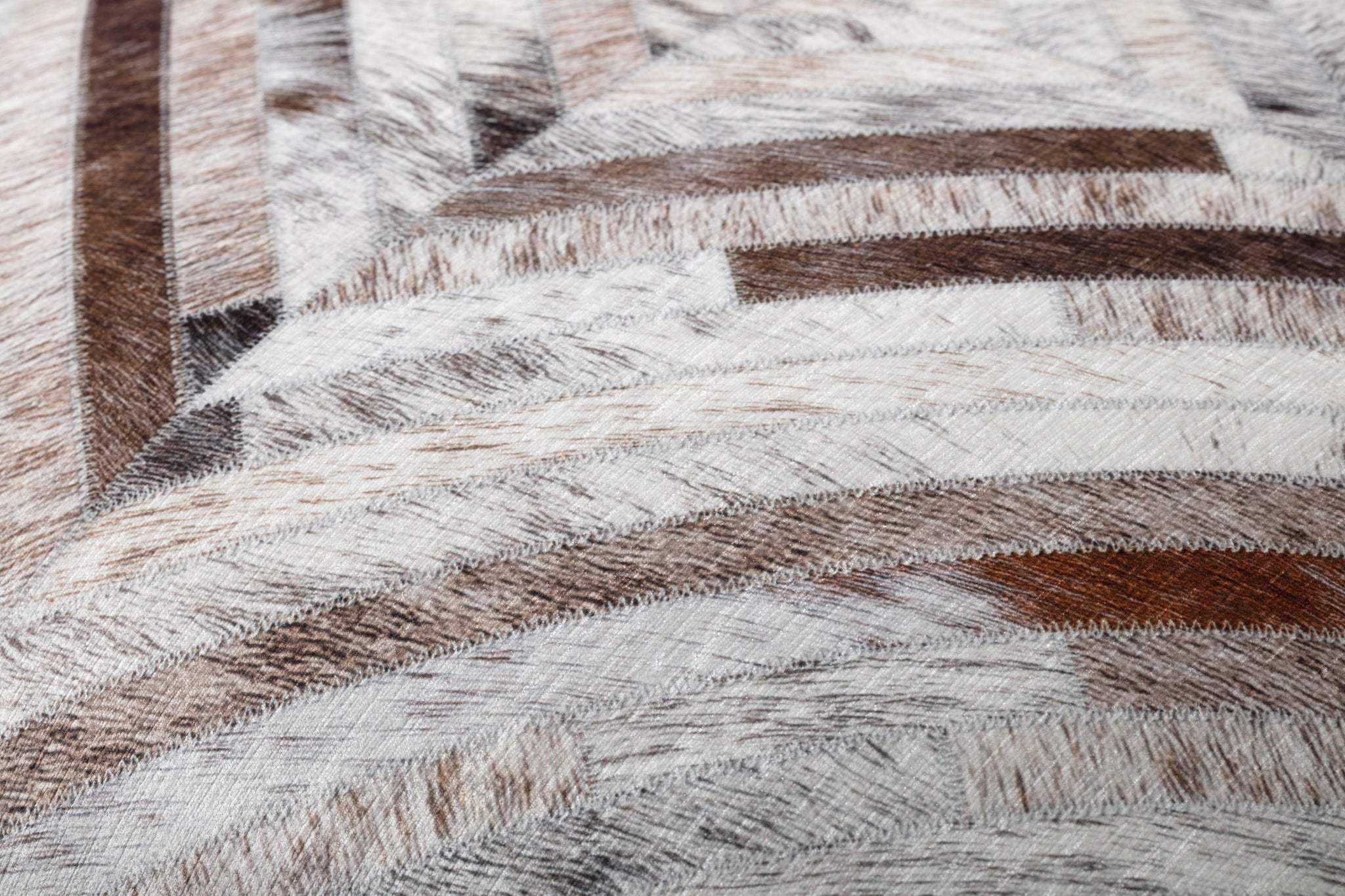 Grey / Multi Floor Pillow shown from a different angle to reveal its pattern.