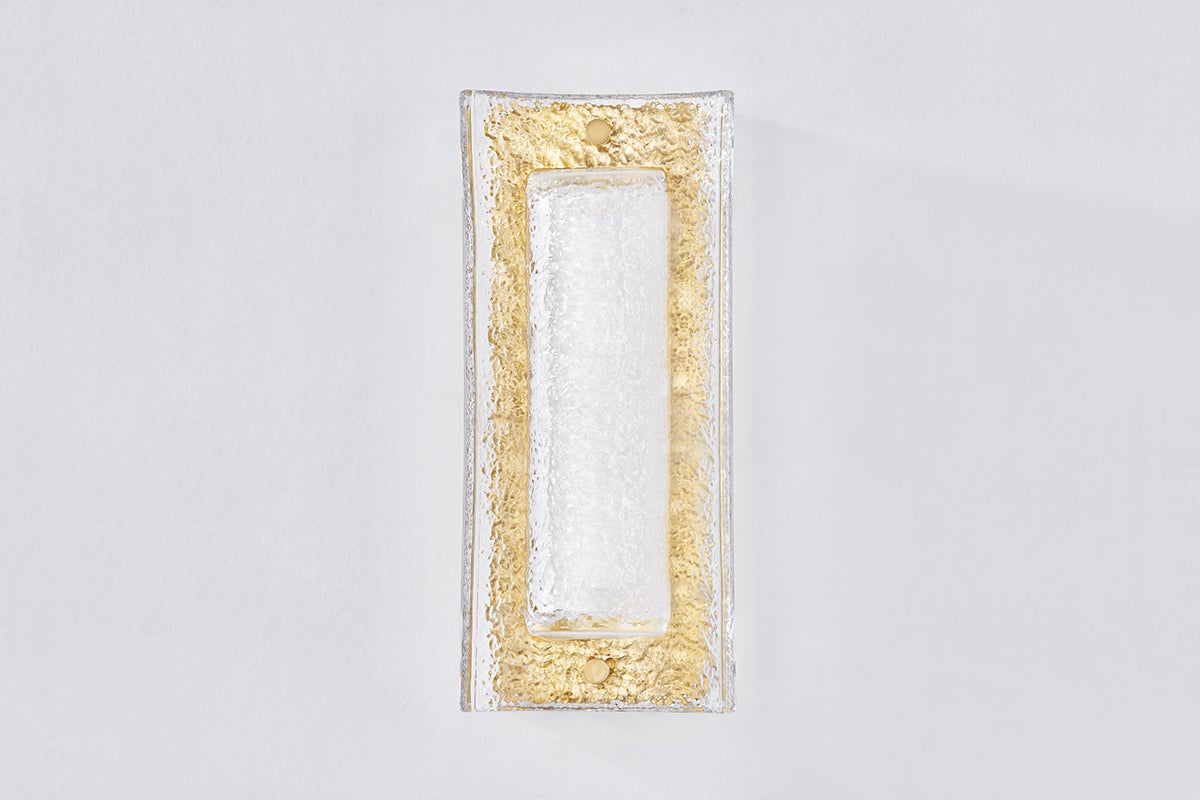 Philmont Wall Sconce in aged brass shown from a second angle to highlight the arm curve and shade silhouette.