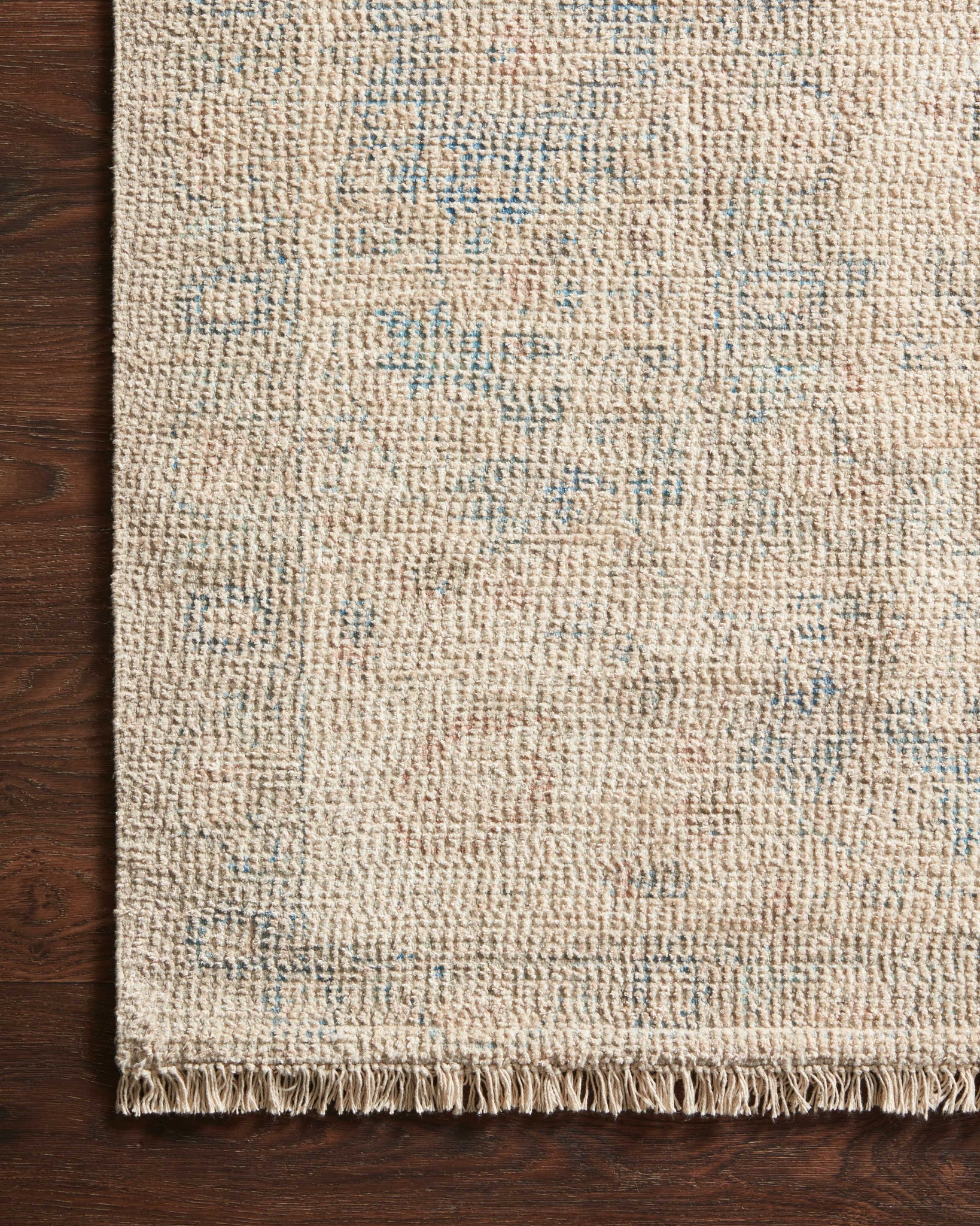 Side view of the Priya Natural / Blue rug.