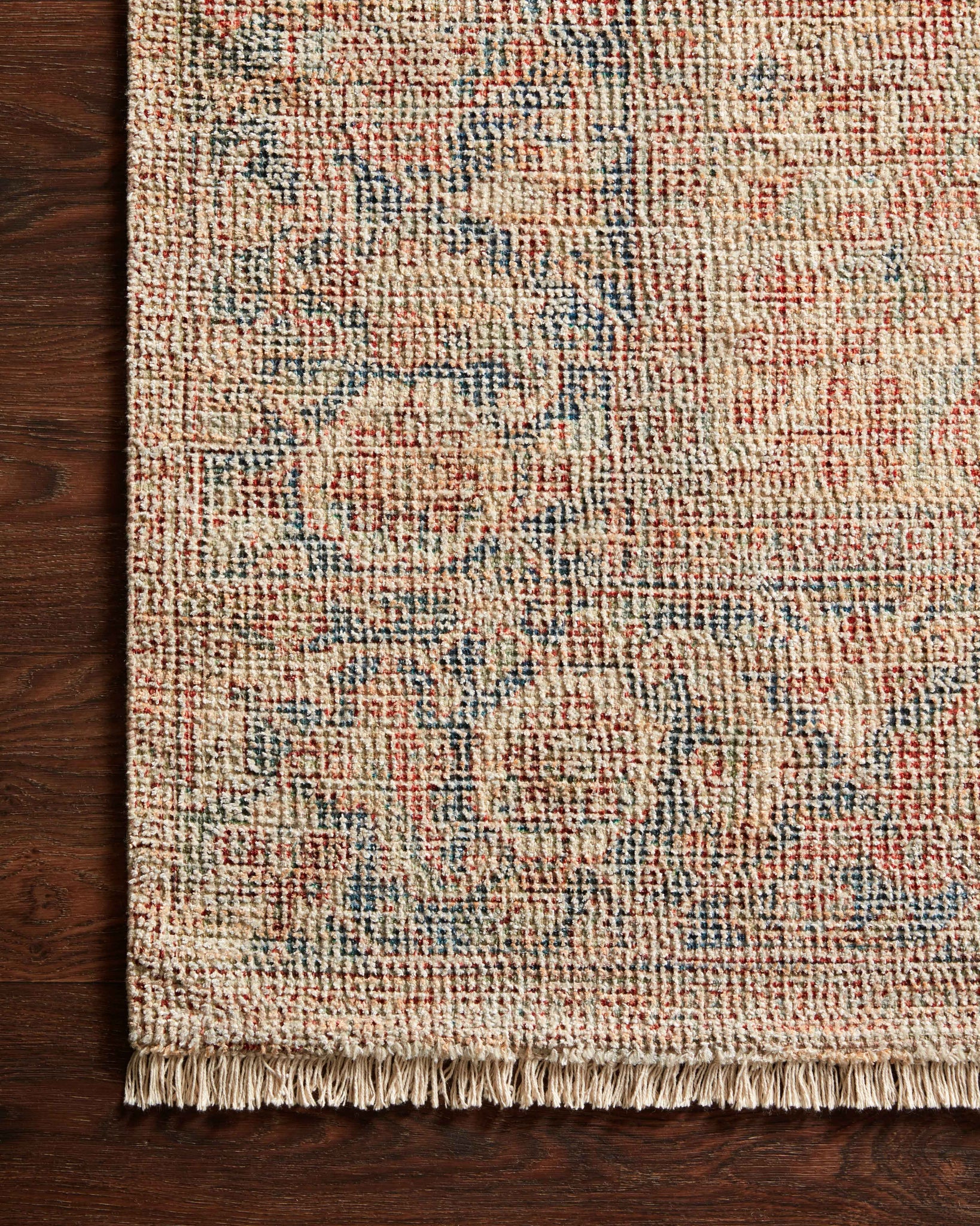Side view of the Priya Brick / Navy rug.