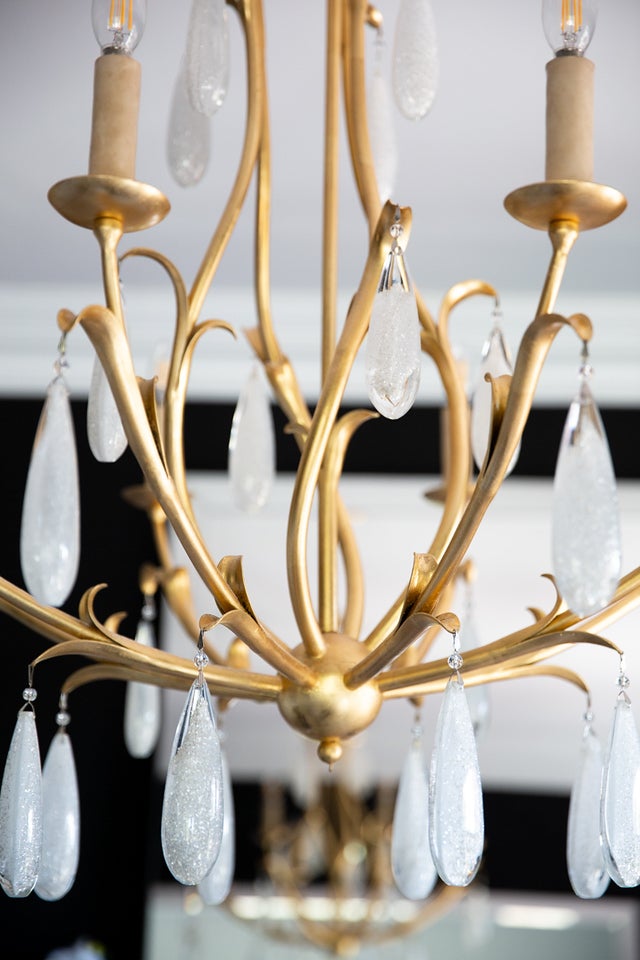 Prosecco Chandelier 34.75" styled in an elegant dining room for warm, layered light at Laurie Yapp Home.