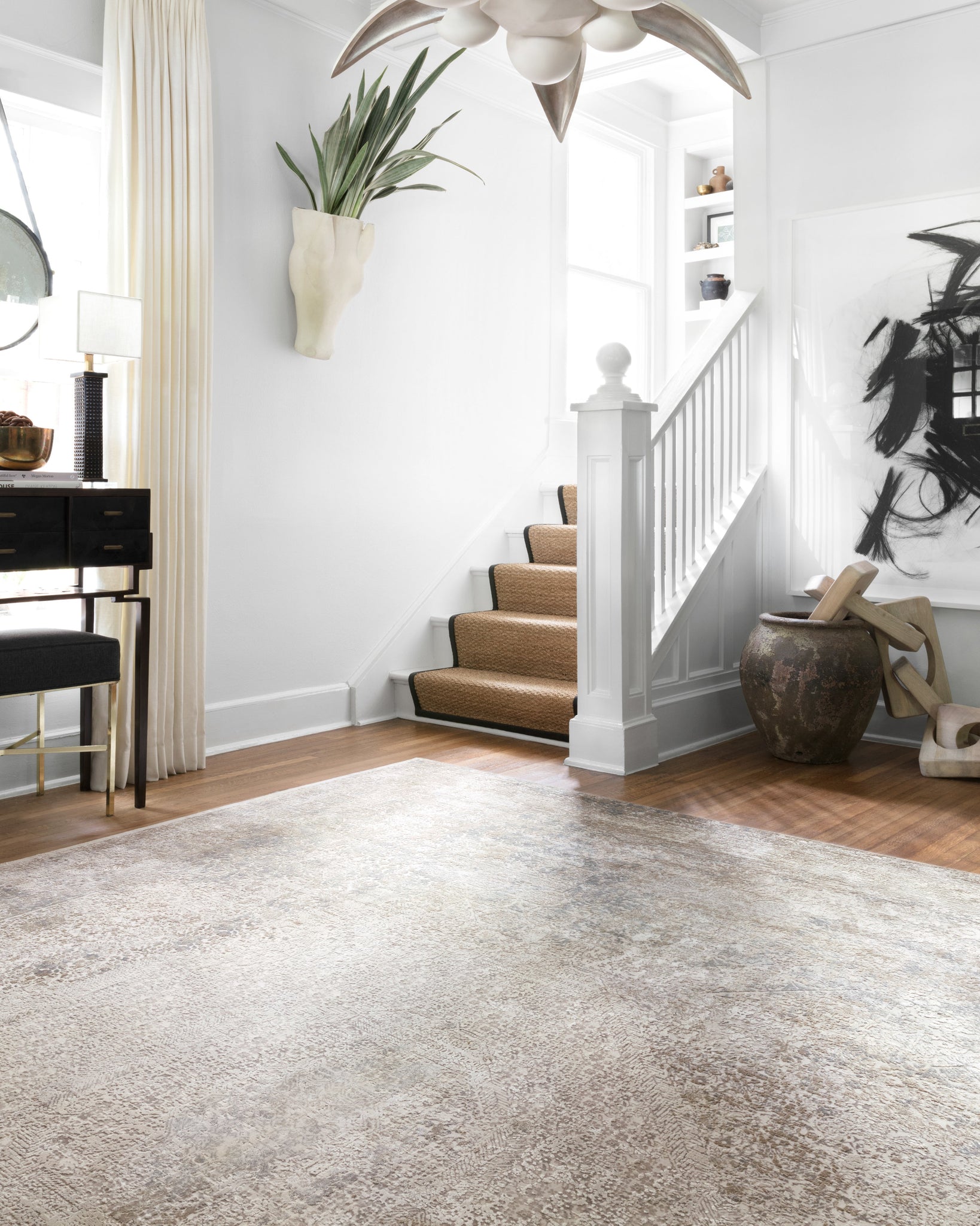 Sienne Ivory / Pebble styled in a living room at Laurie Yapp Home.