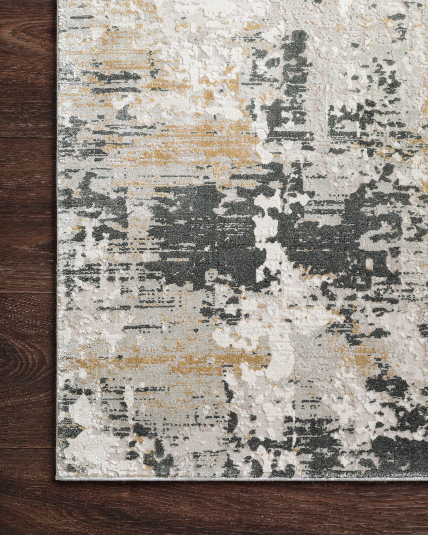 Side view of the Sienne Ivory / Granite rug.