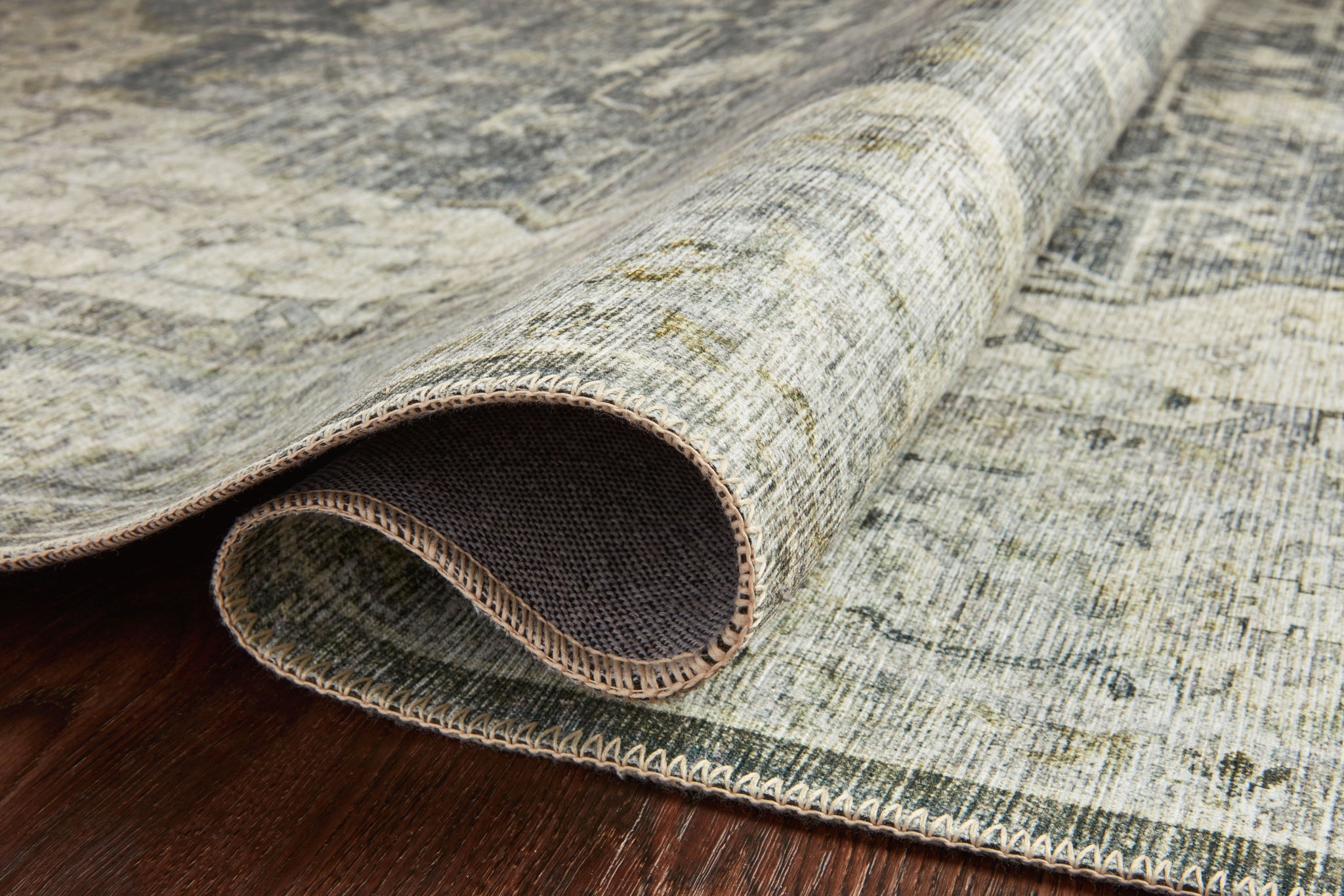 Skye Charcoal / Dove shown from a different angle to reveal its pattern.