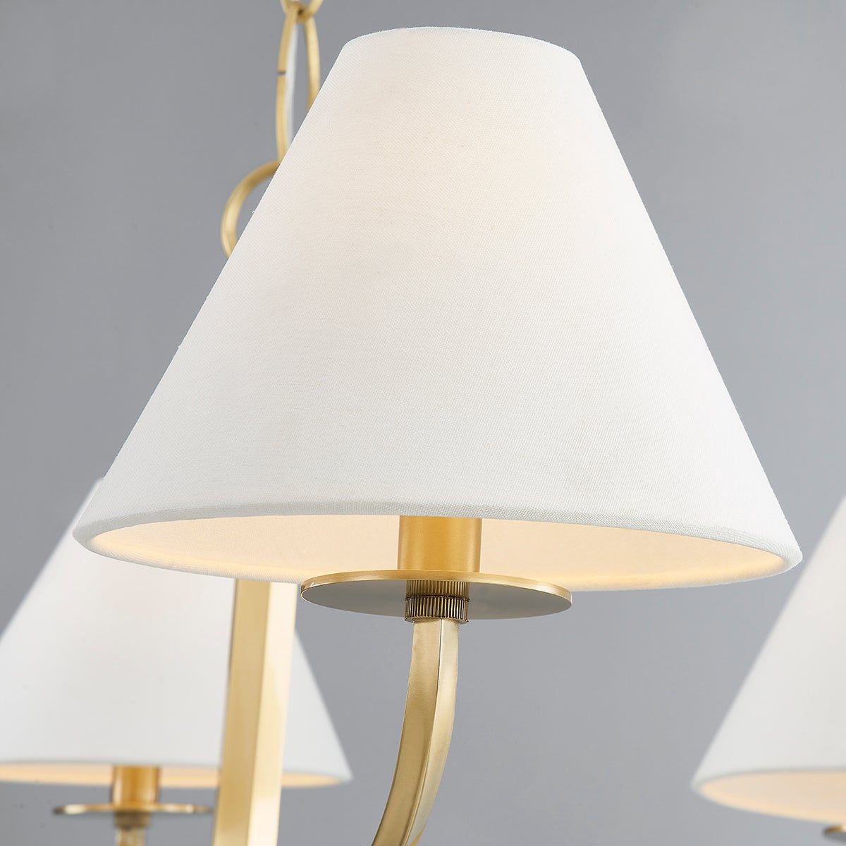 Stacey Chandelier 40.25" in aged brass shown from the front to reveal the frame, arms, and shade detail.