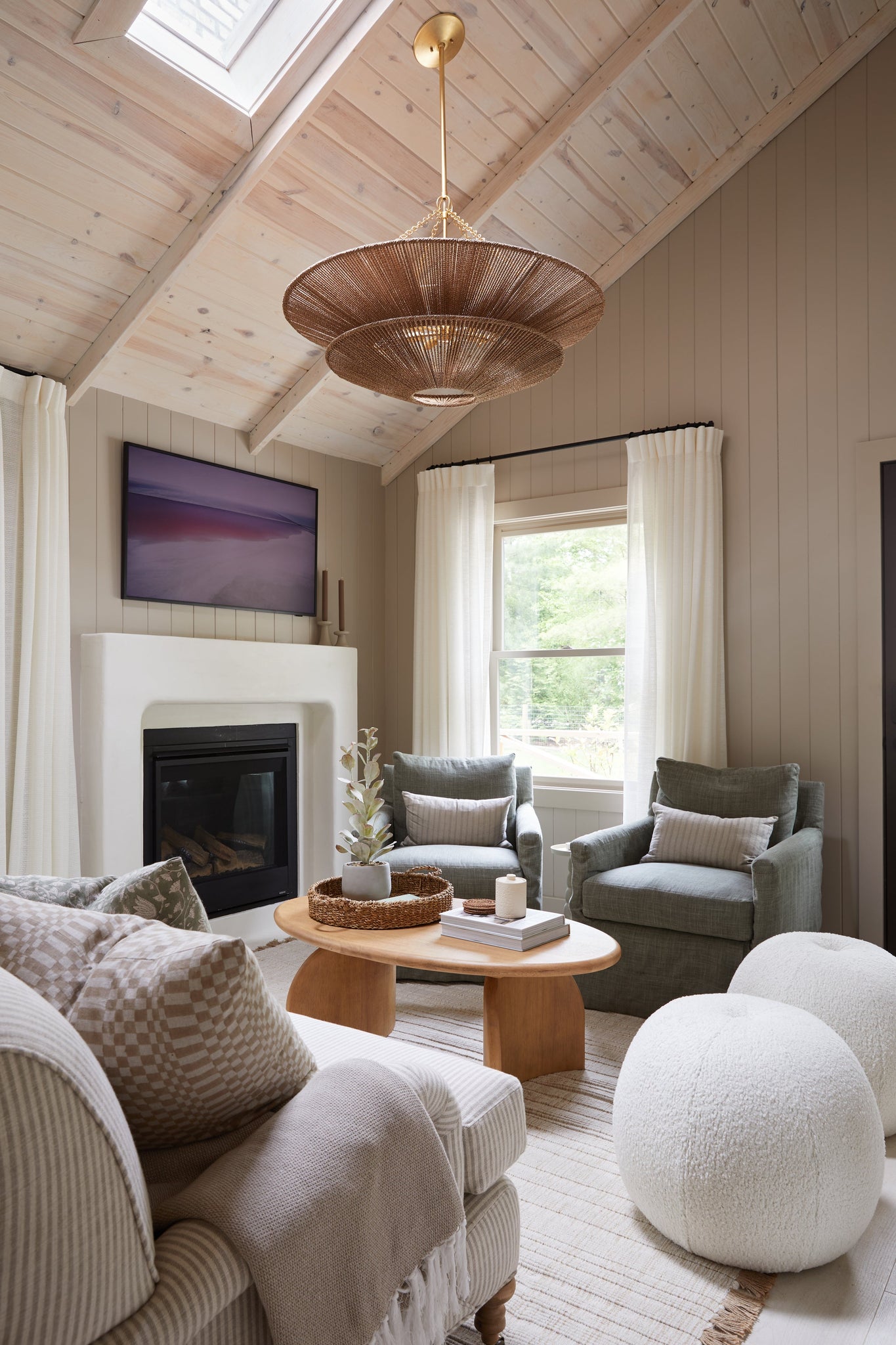 Tropea Chandelier styled in a formal living room for warm, layered light at Laurie Yapp Home.